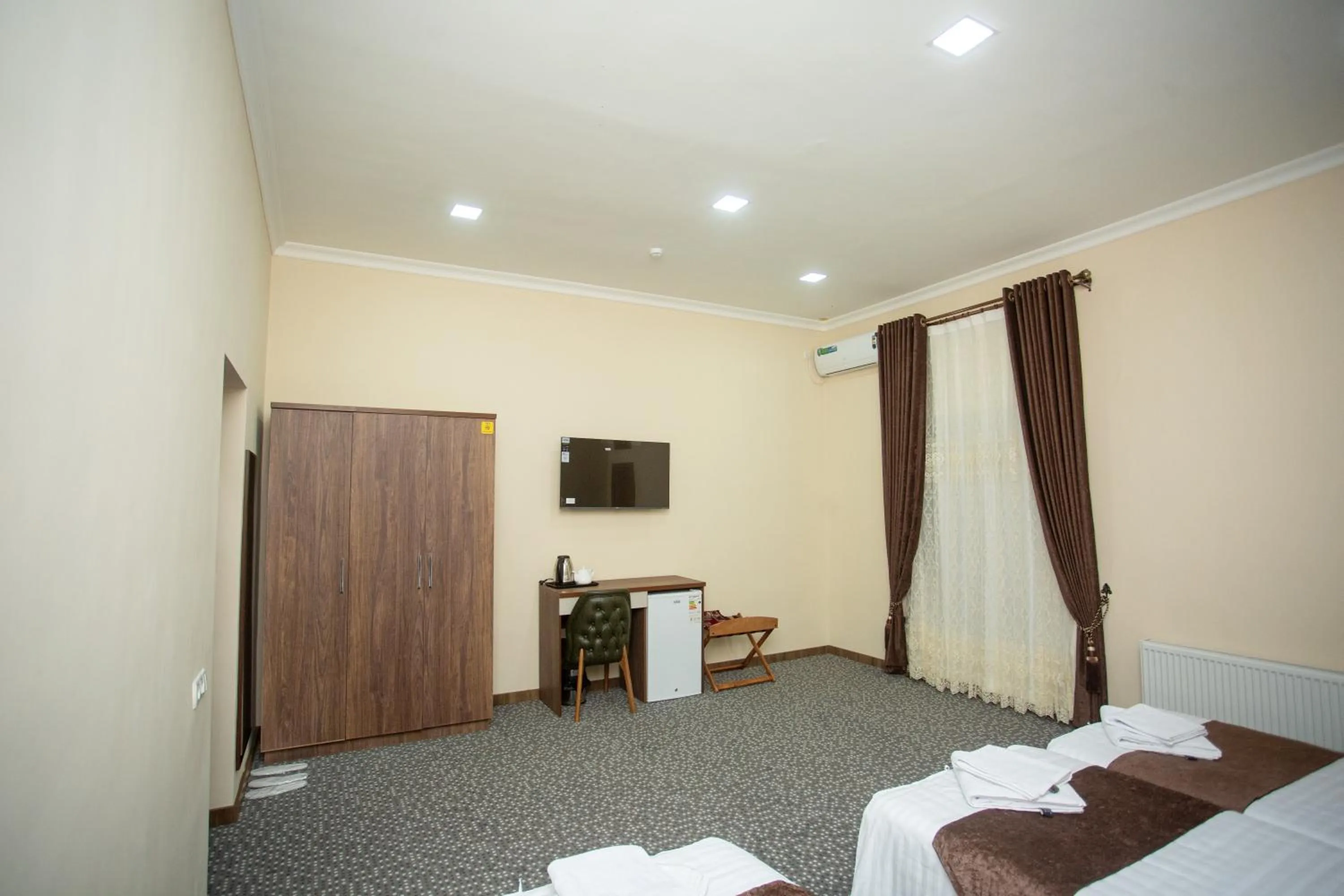 TV and multimedia, Bed in Rayyan Hotel Samarkand