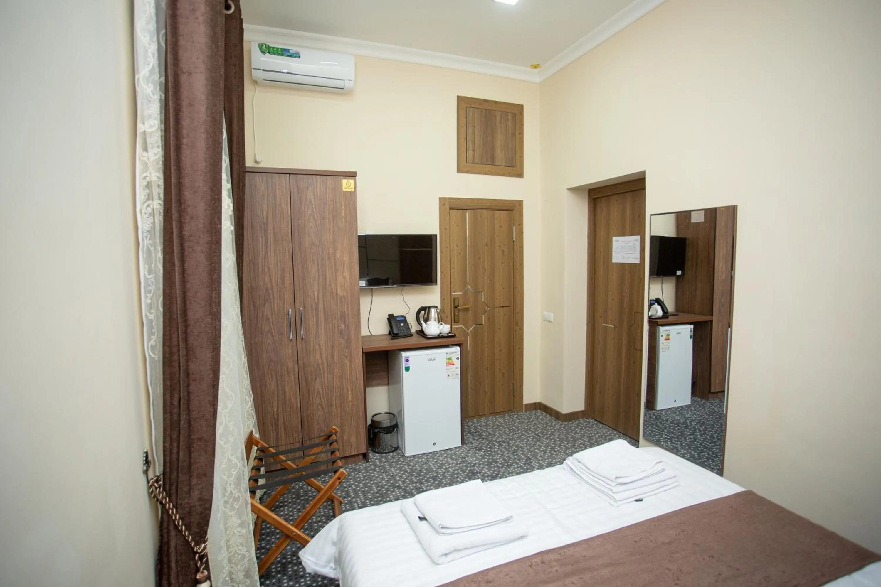 Bed in Rayyan Hotel Samarkand