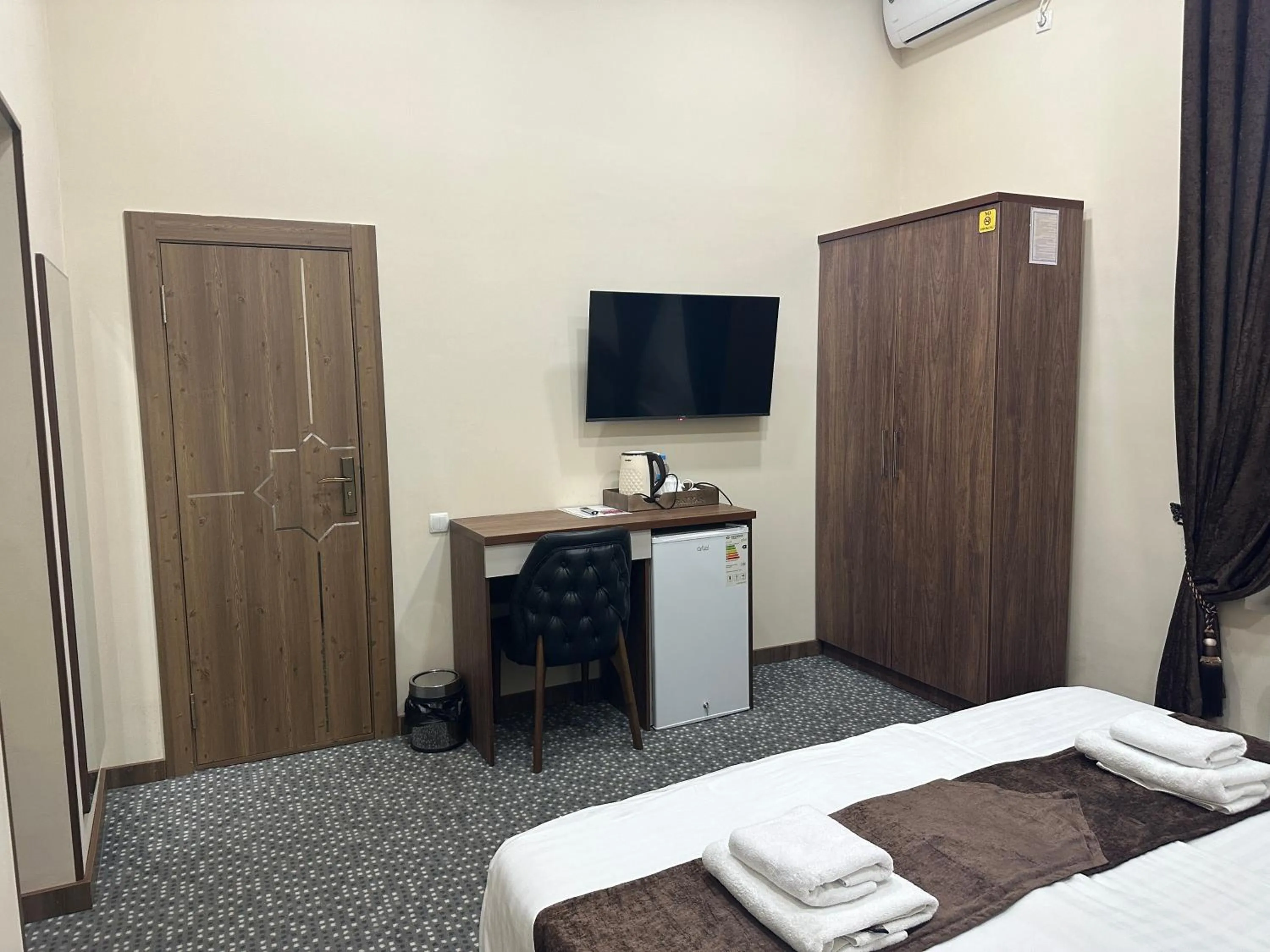 Bed in Rayyan Hotel Samarkand