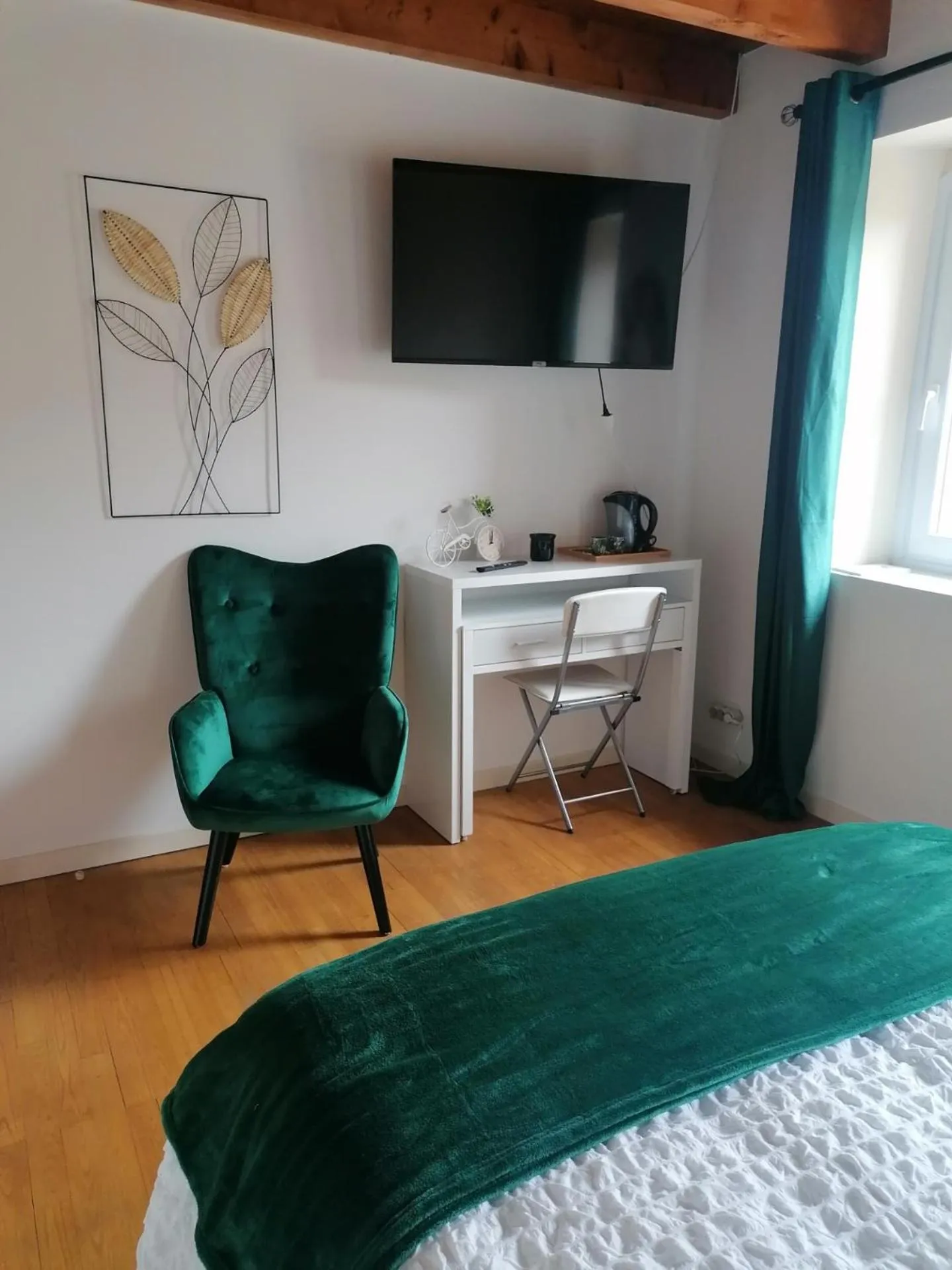 TV and multimedia in La maison d'Hôtes Du Moulin