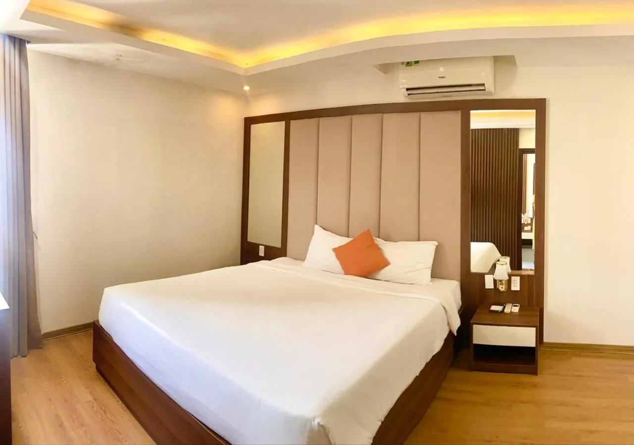 Bed in Pariat River Front Hotel