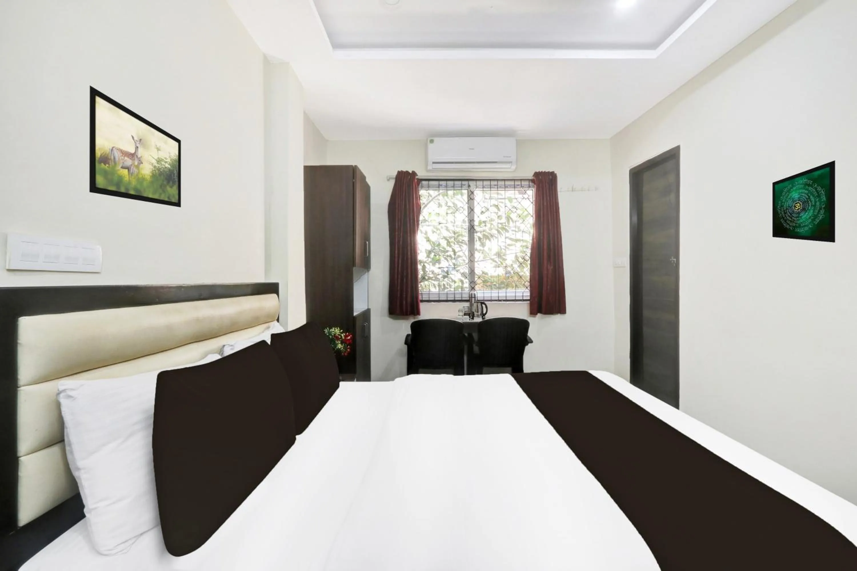 Bedroom, Bed in Super Hotel O MVP Double Road