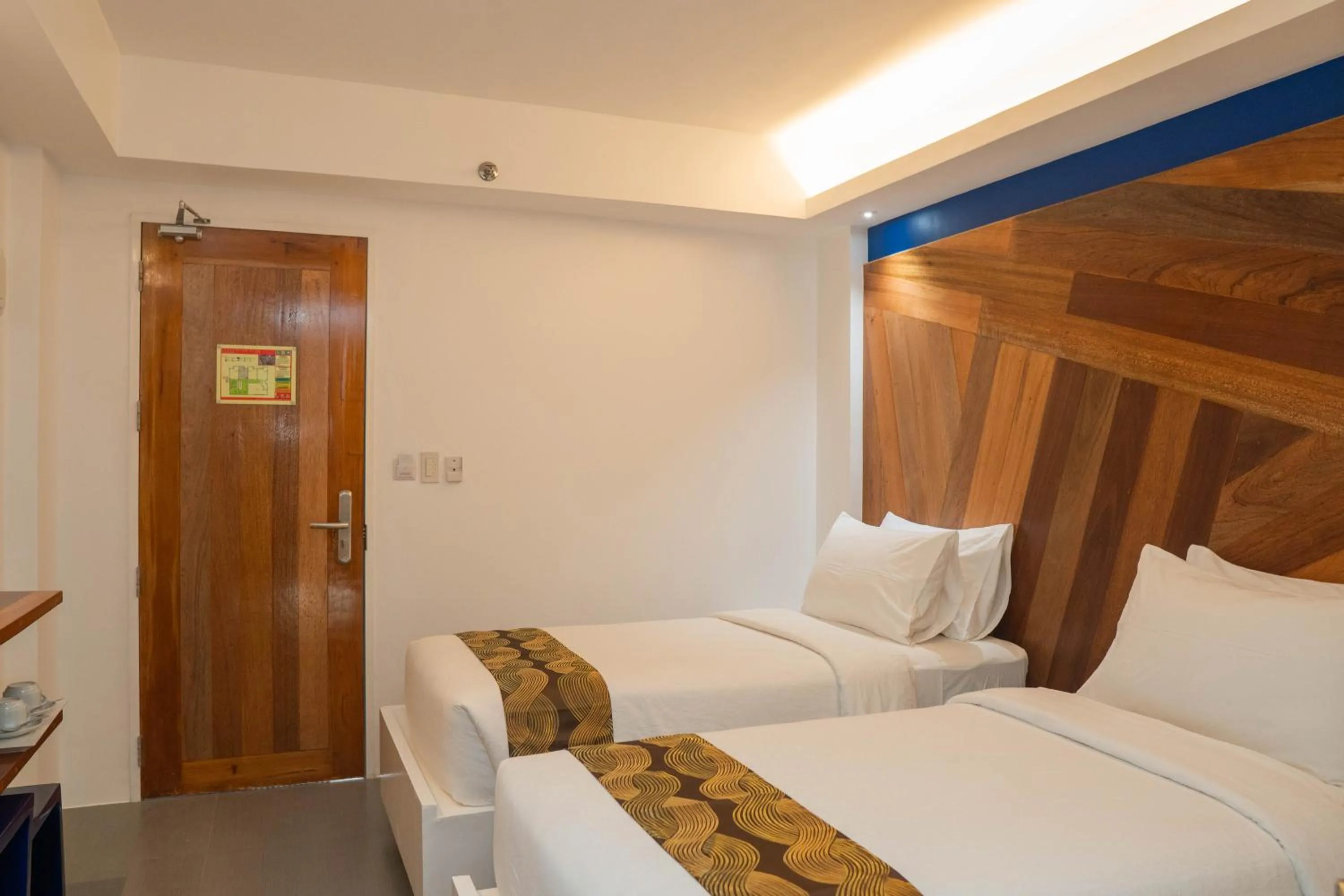 Bed in The Paragon Boracay Suites