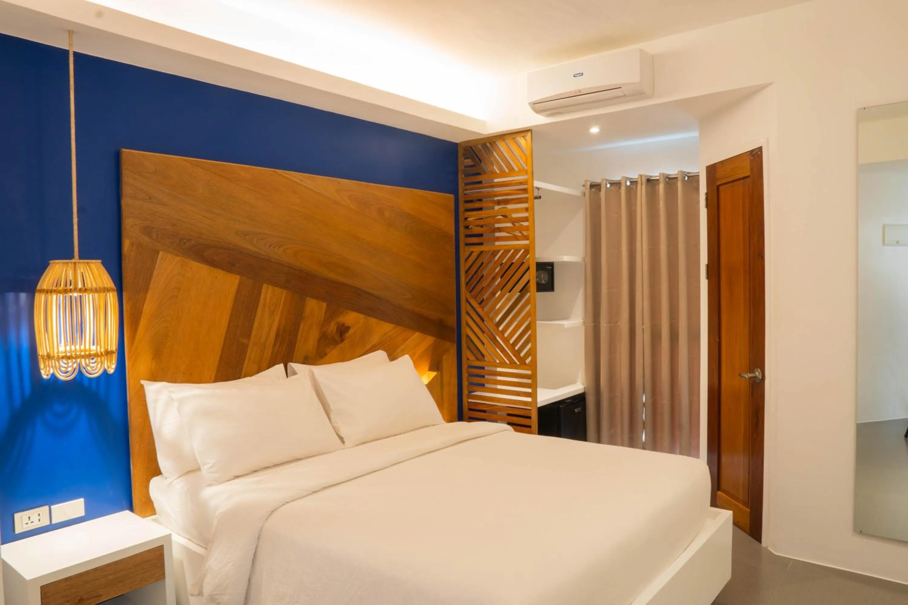 Bed in The Paragon Boracay Suites