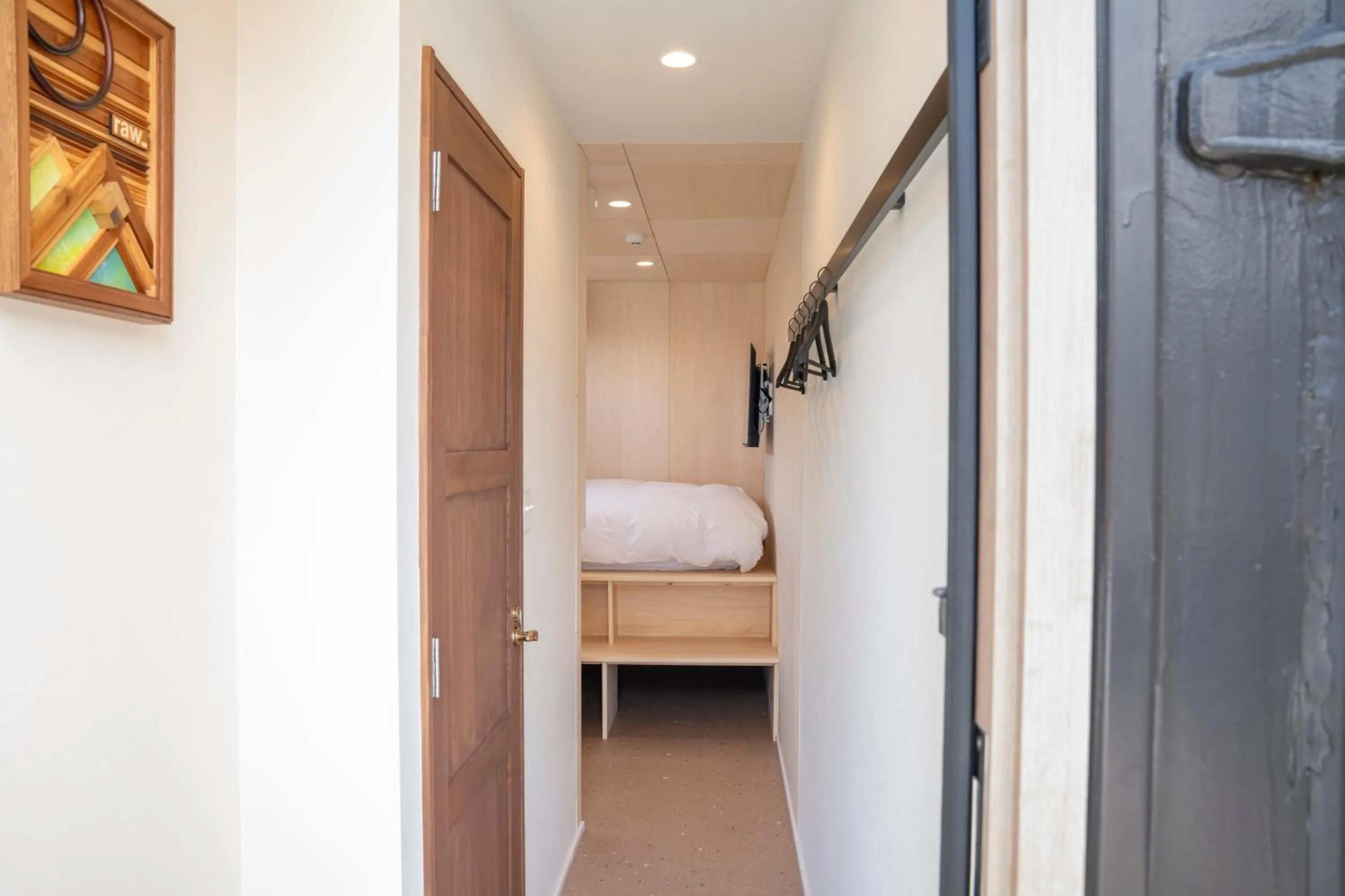 Facade/entrance, Bed in raw_