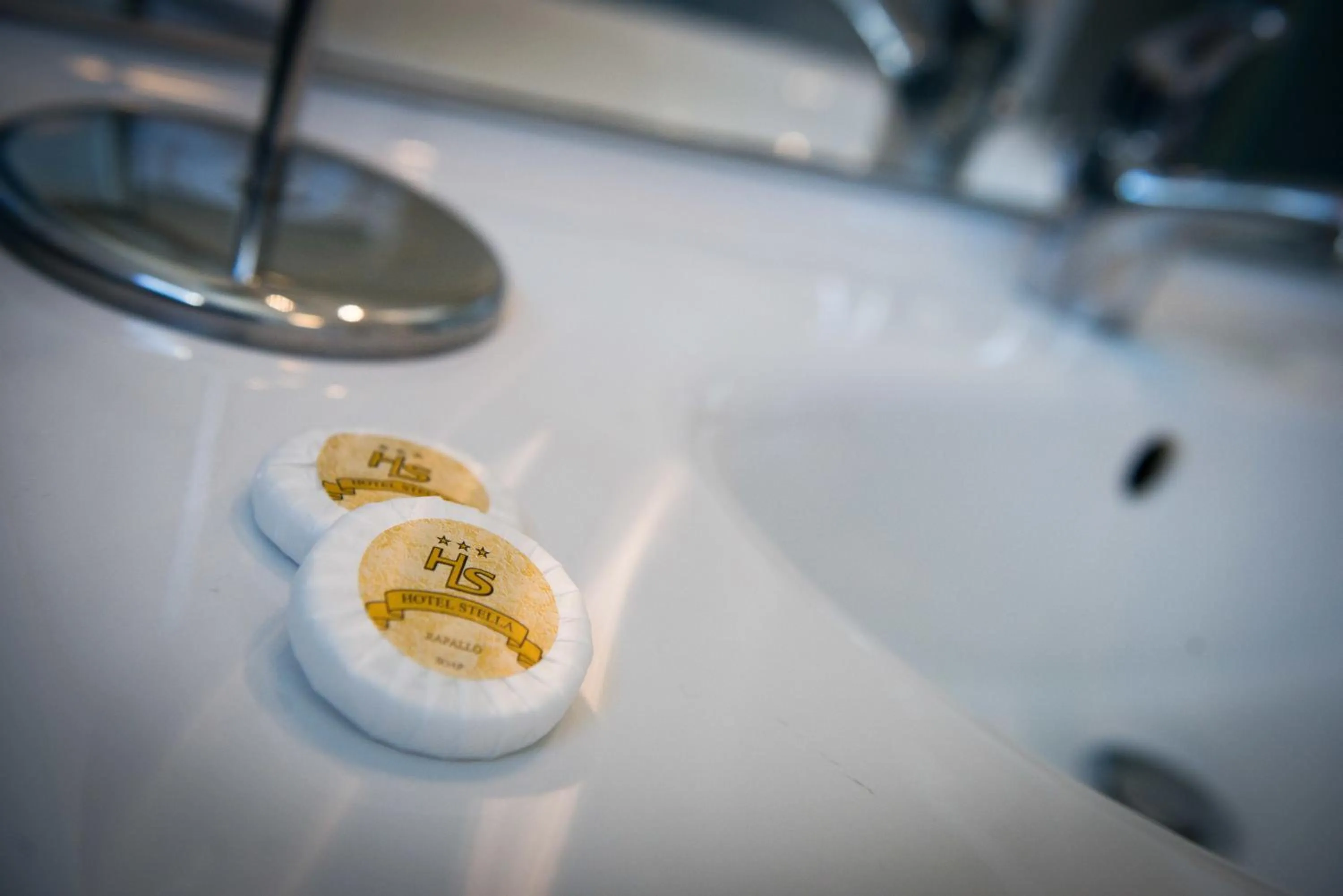 Property logo or sign in Hotel Stella