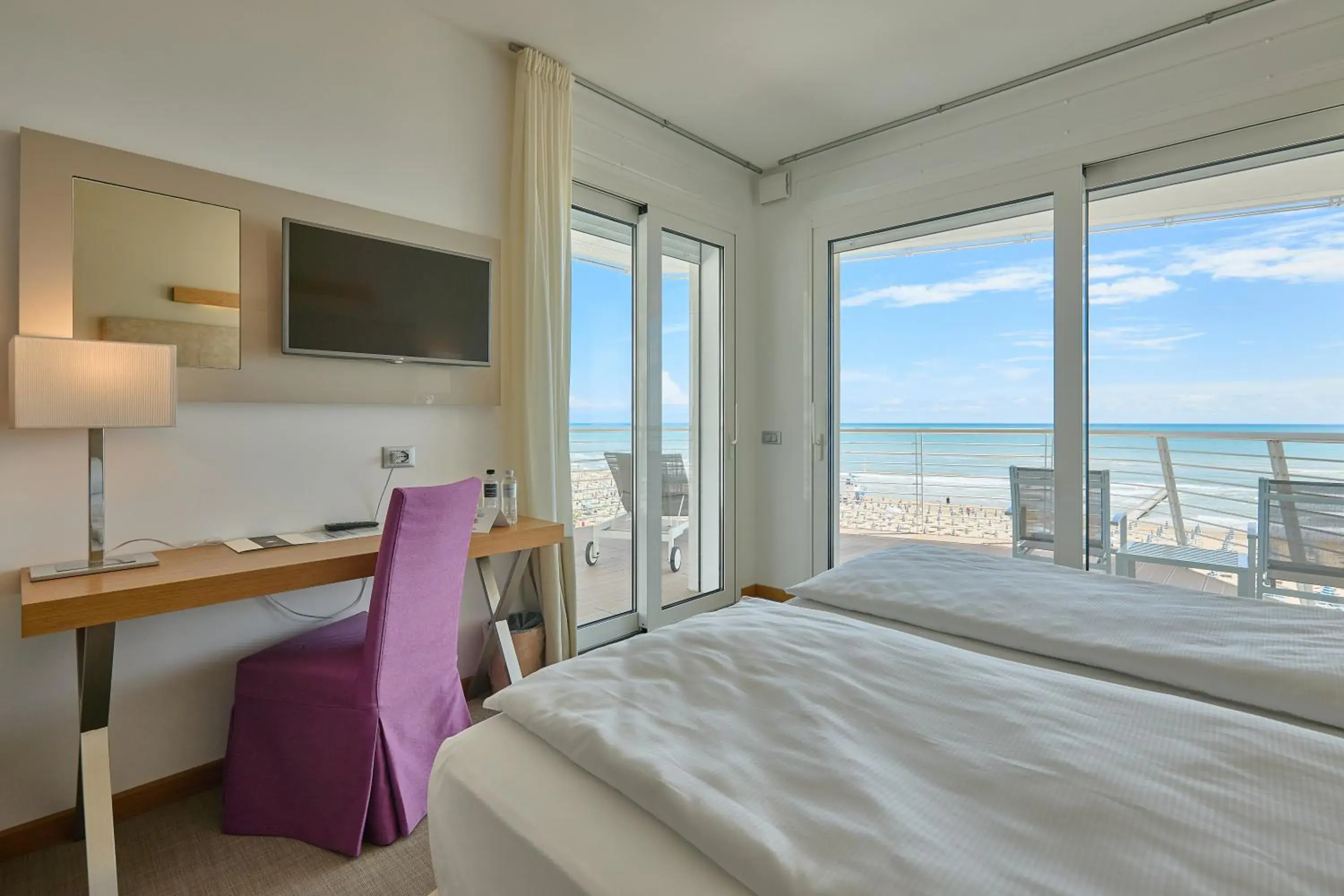 View (from property/room), Bed in Hotel Le Soleil View (from property/room), Bed in Hotel Le Soleil