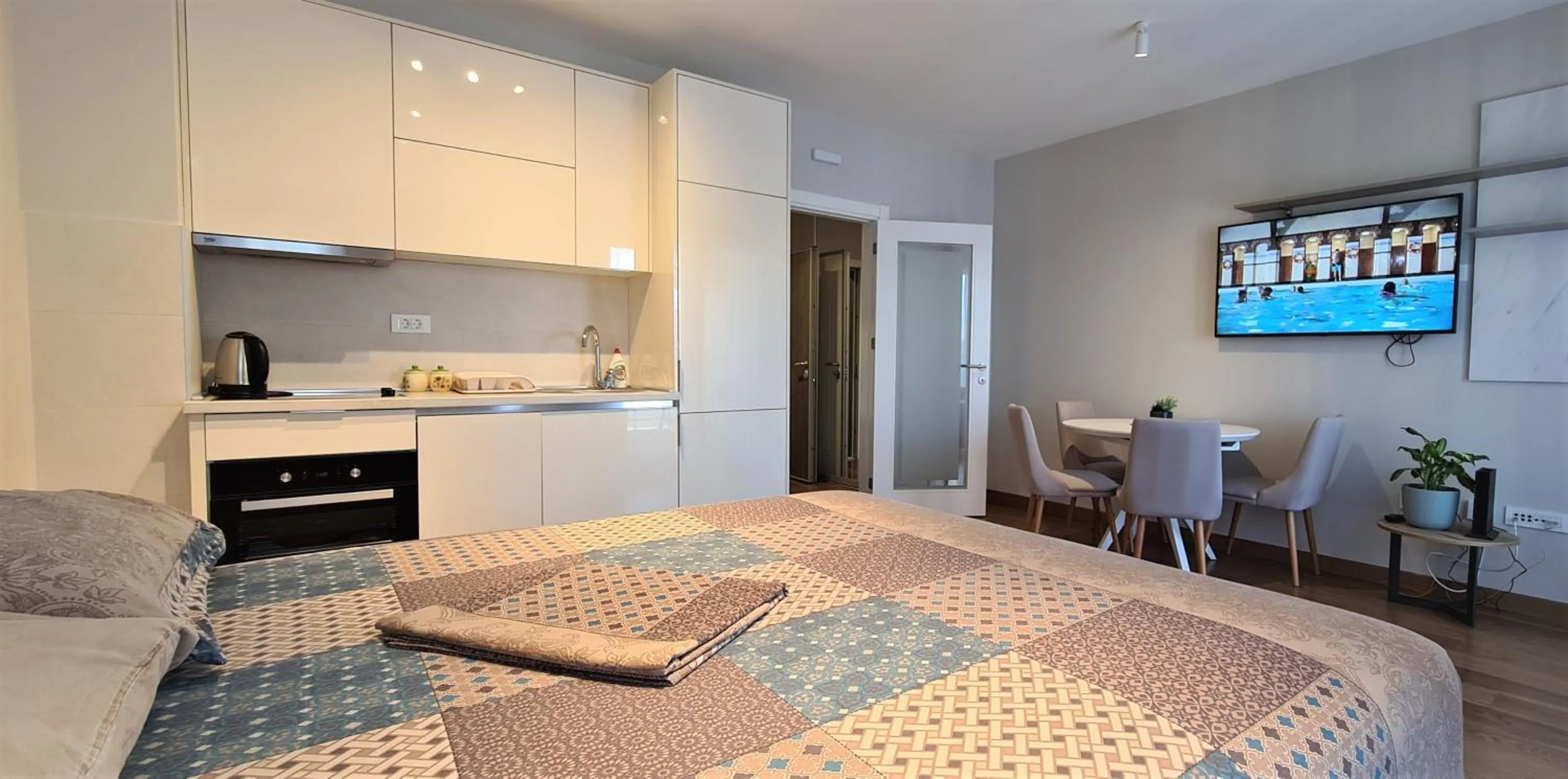 Bed in Green Apartments Podgorica With Garage