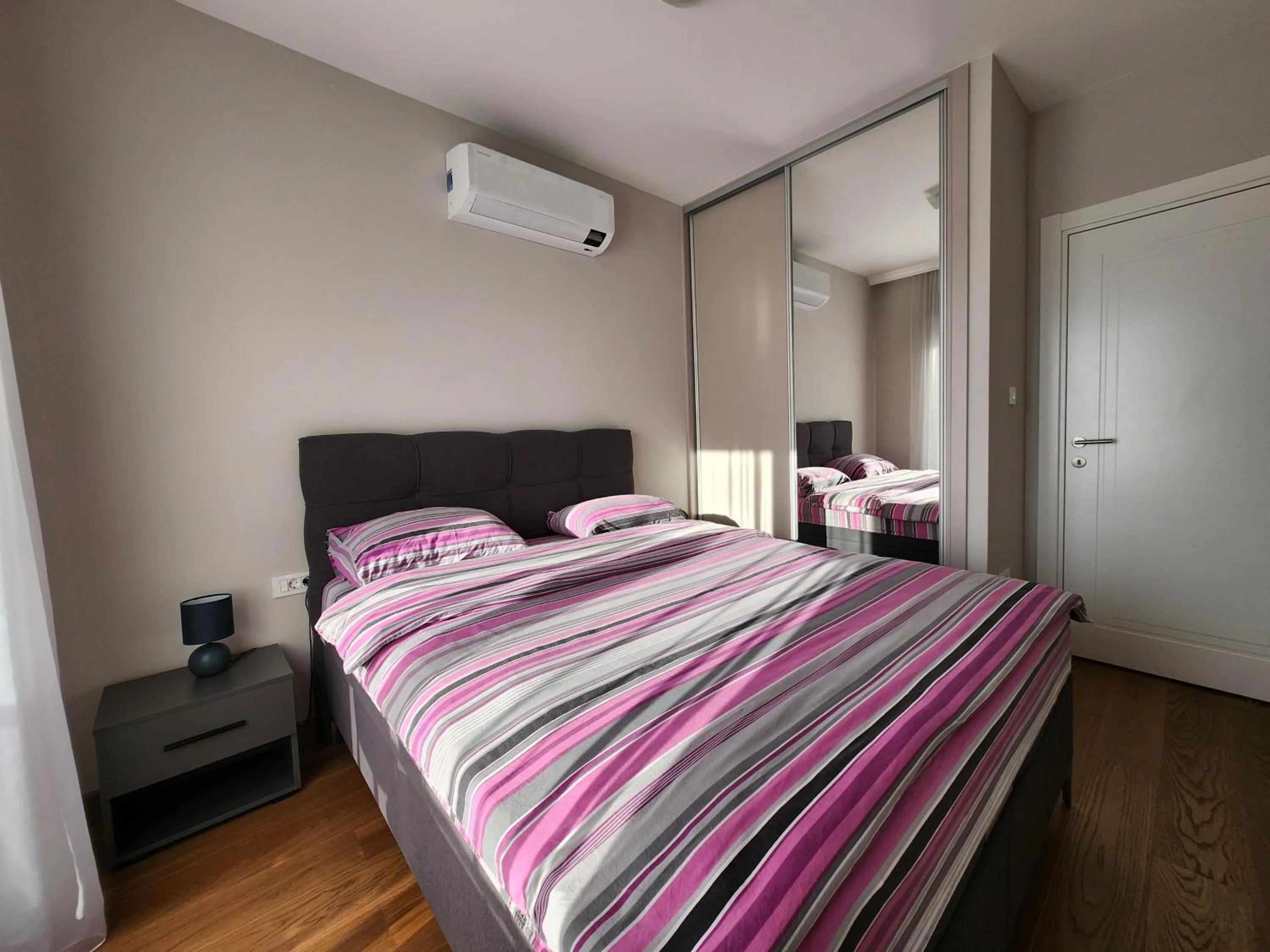 Bedroom, Bed in Green Apartments Podgorica With Garage