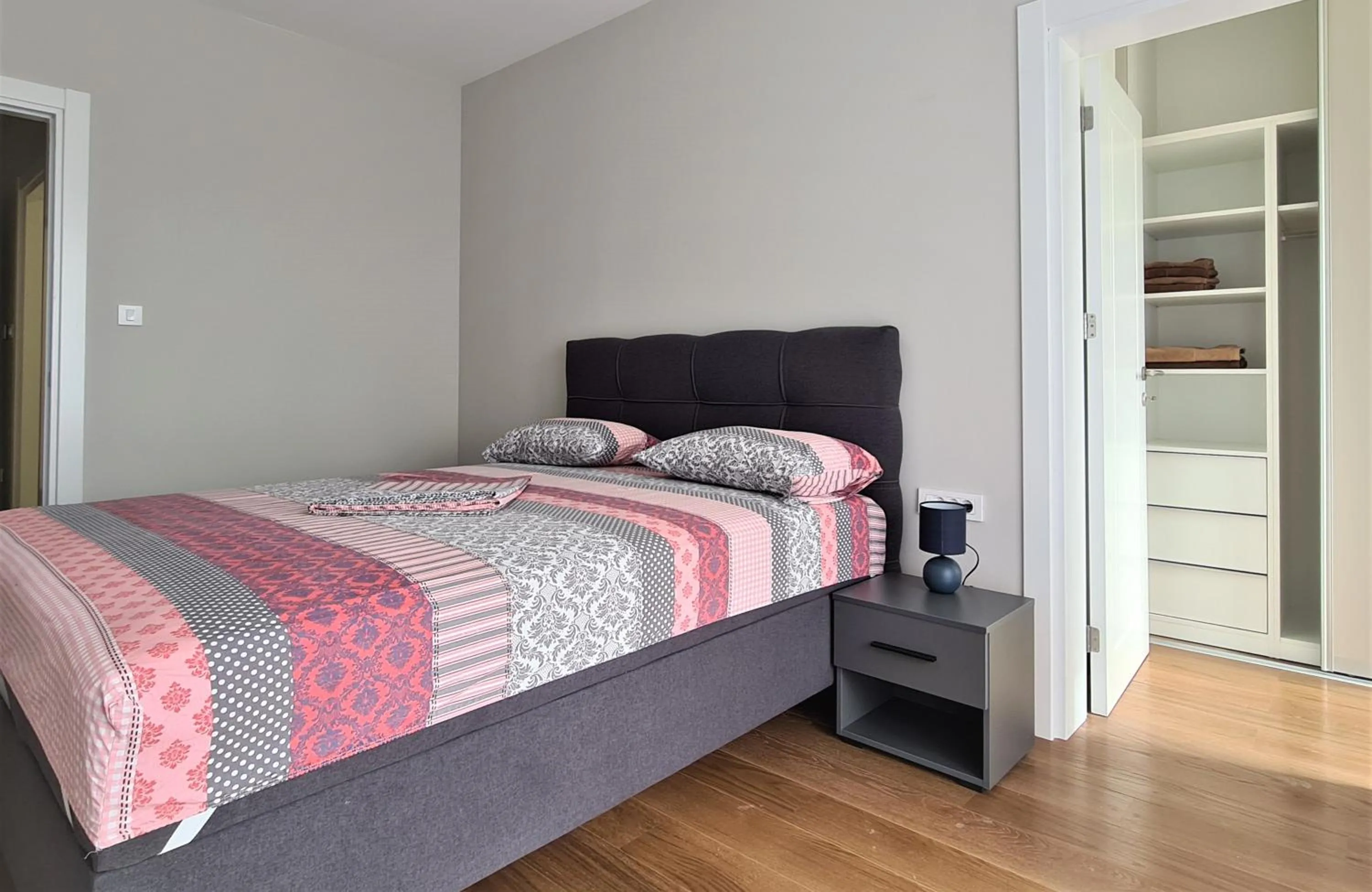 Bed in Green Apartments Podgorica With Garage
