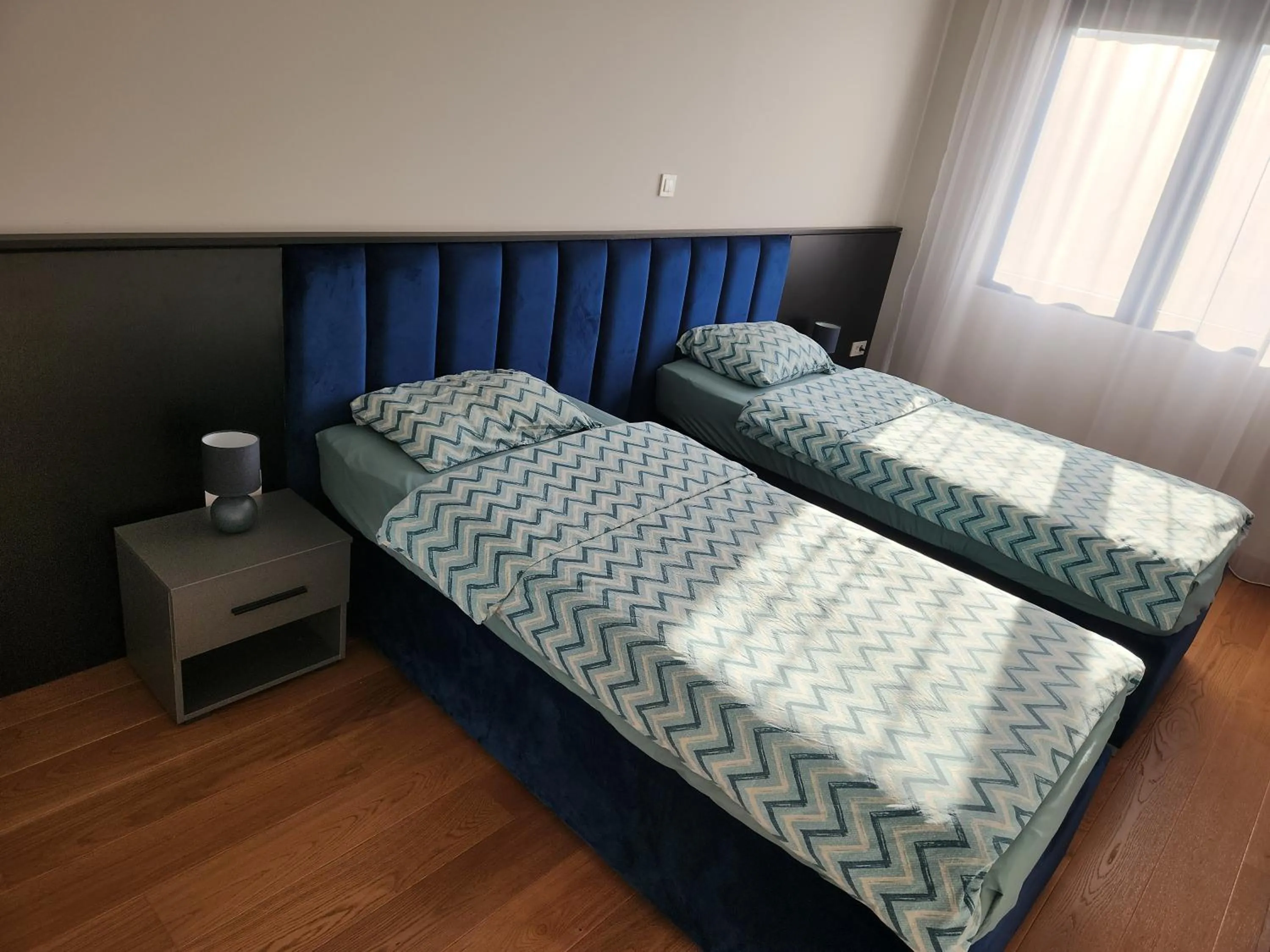 Bedroom, Bed in Green Apartments Podgorica With Garage
