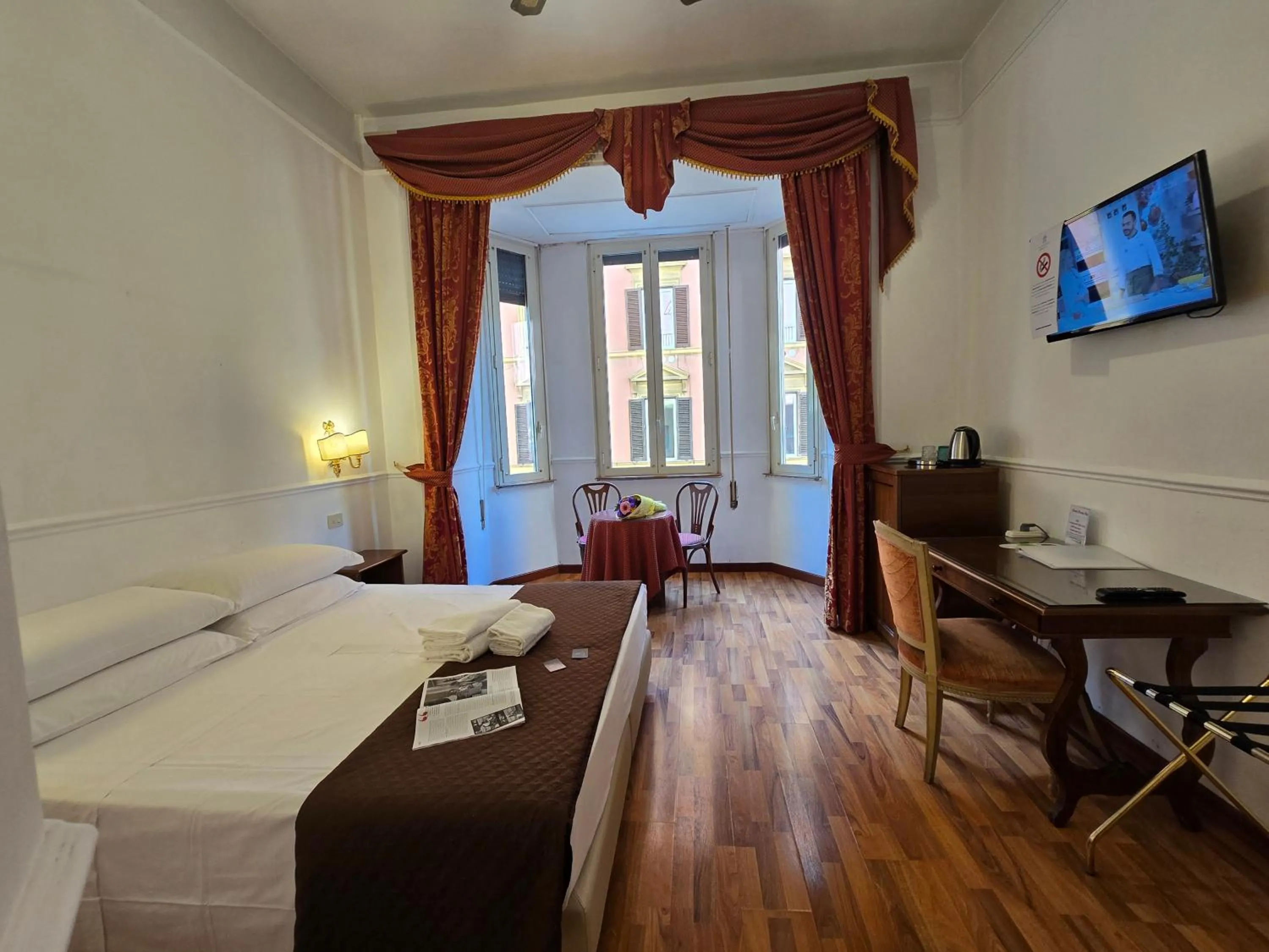 Photo of the whole room, Bed in Hotel Porta Pia