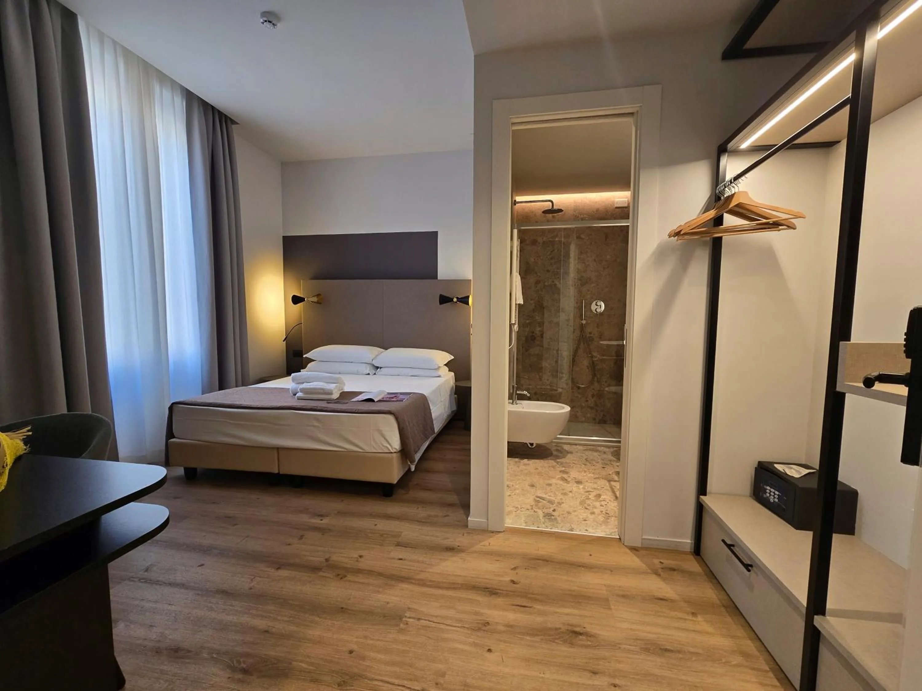 Photo of the whole room, Bed in Hotel Porta Pia