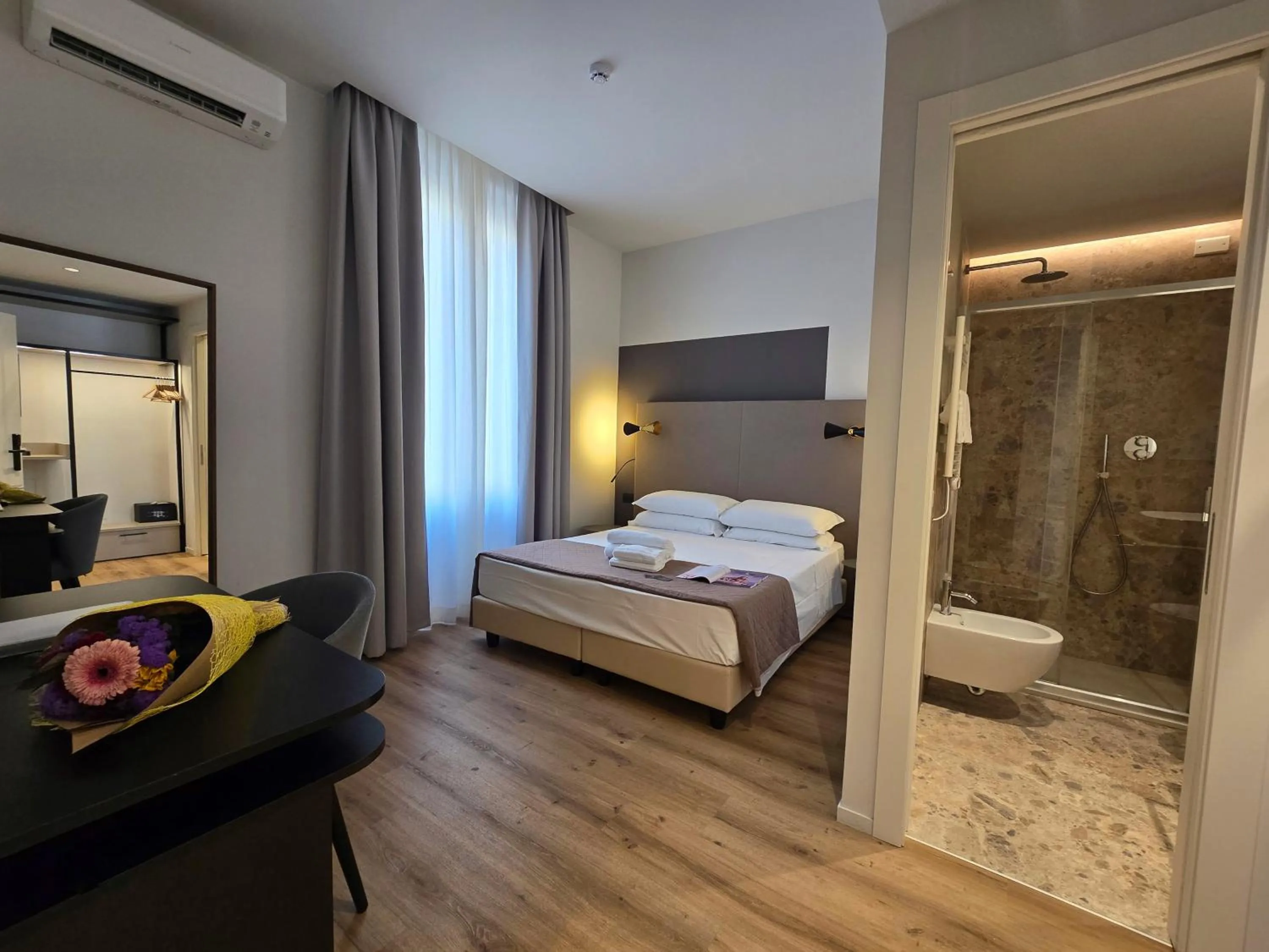 Photo of the whole room, Bed in Hotel Porta Pia