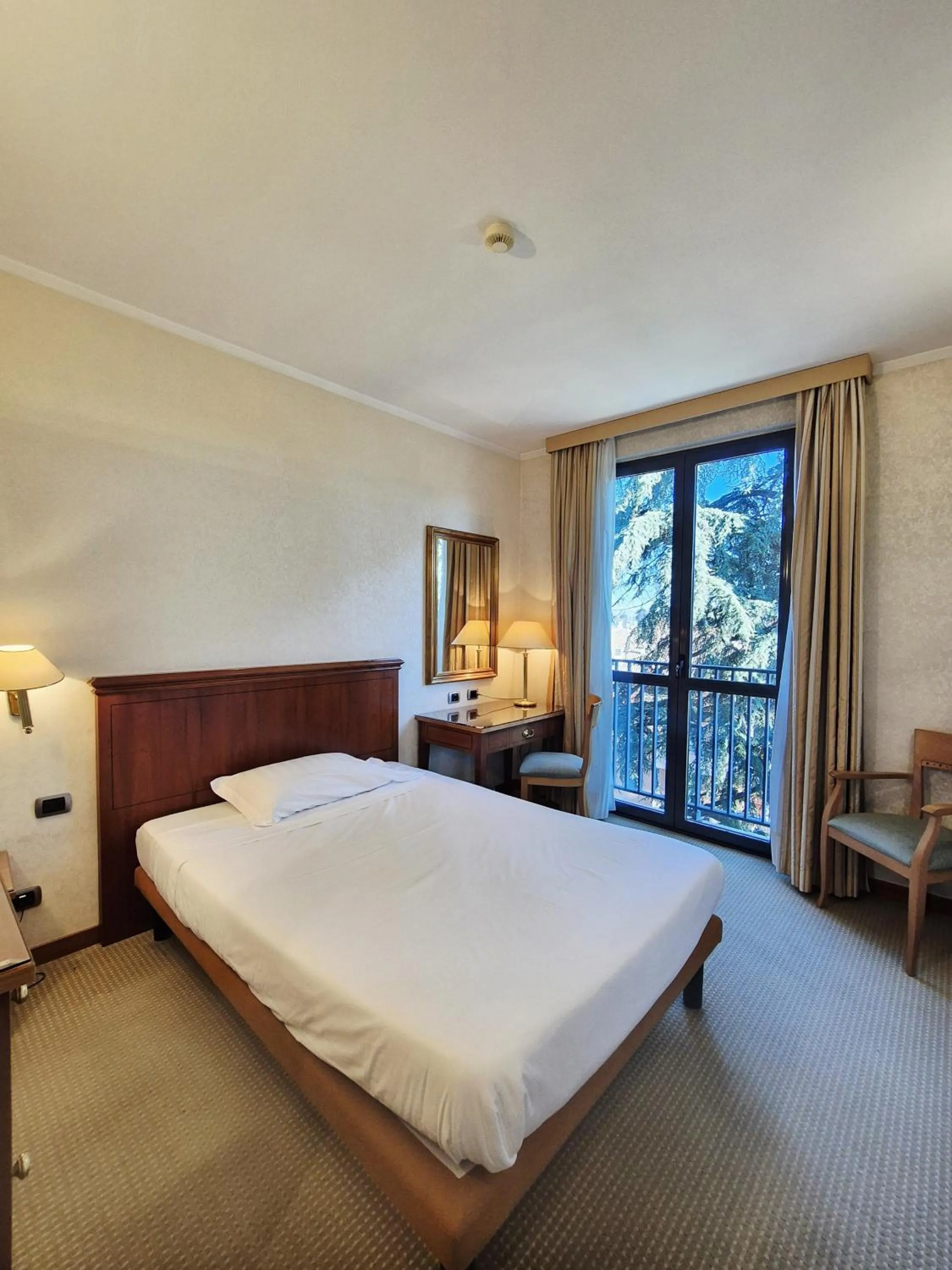 Bed in Hotel Excelsior Magenta