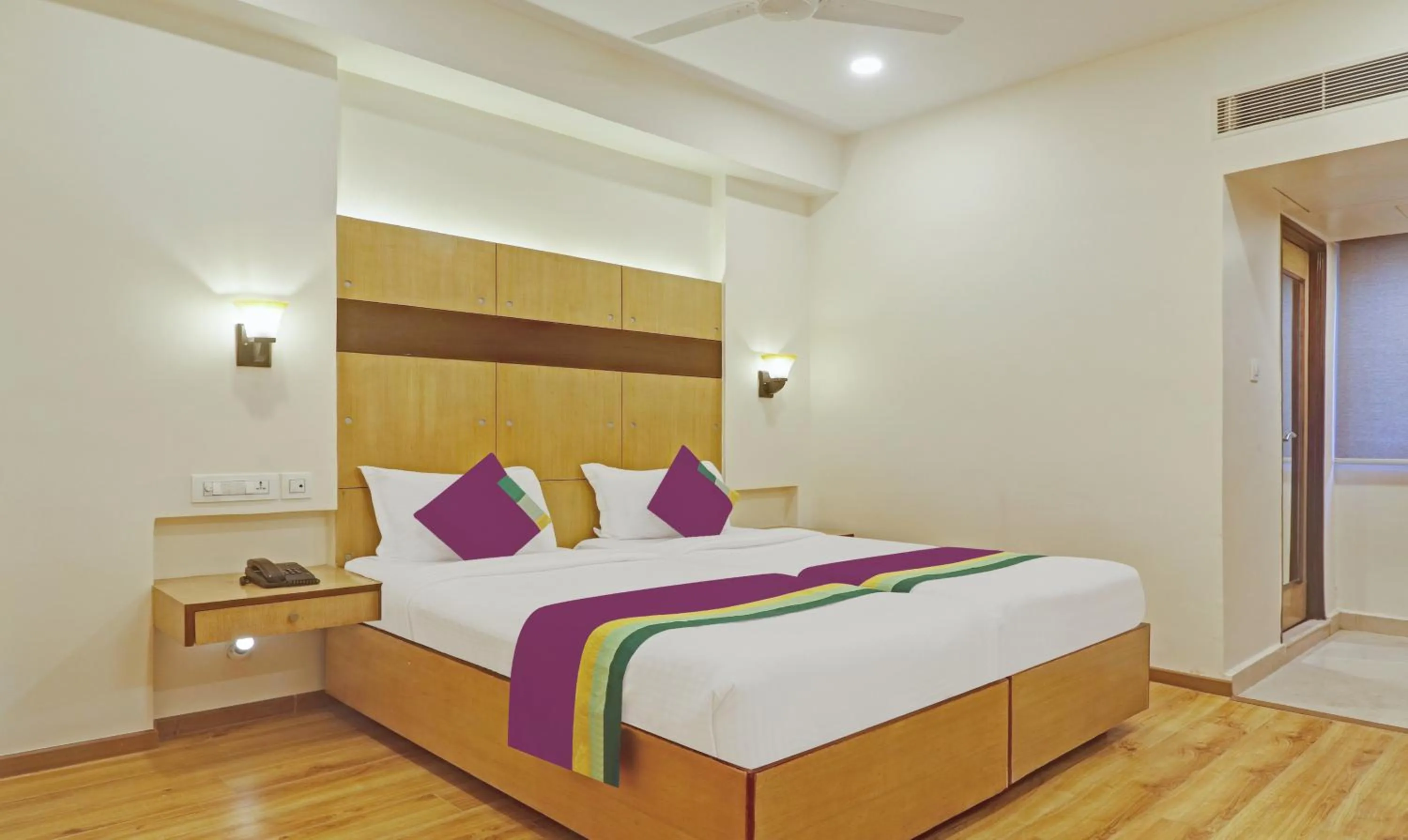 Bedroom, Bed in Treebo Premium Seven Lake View