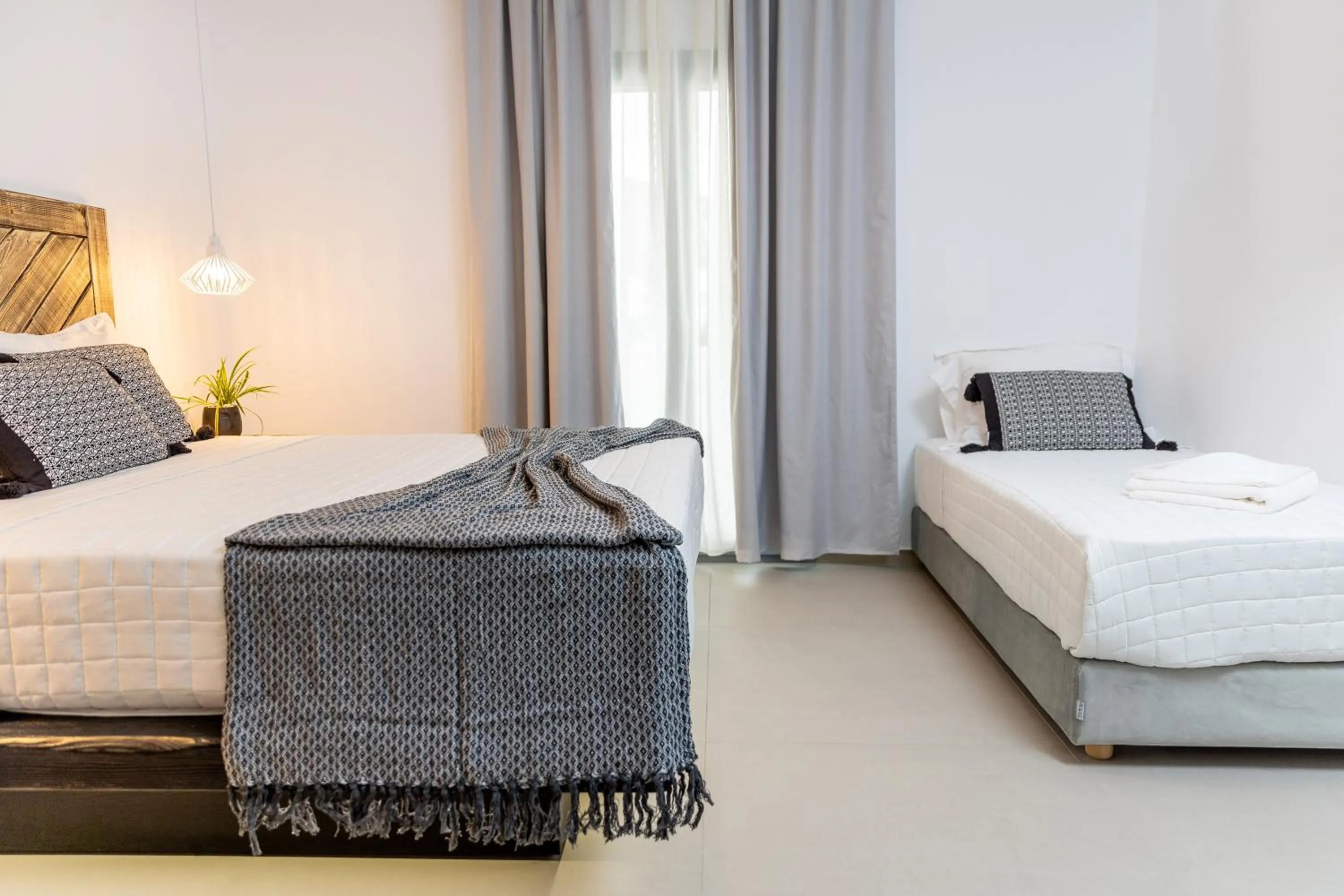 Bed in Alenor City Hotel