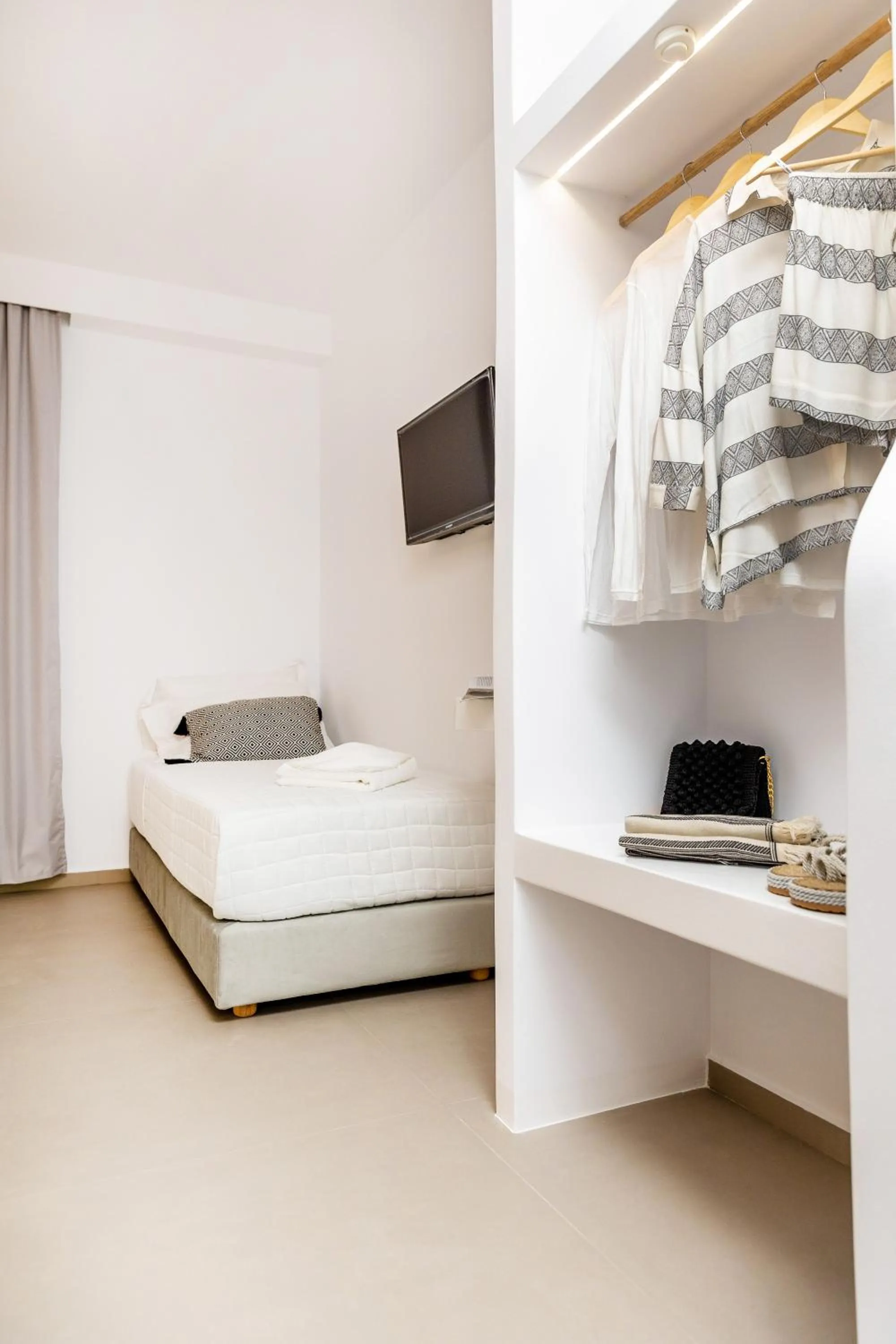 Bed in Alenor City Hotel