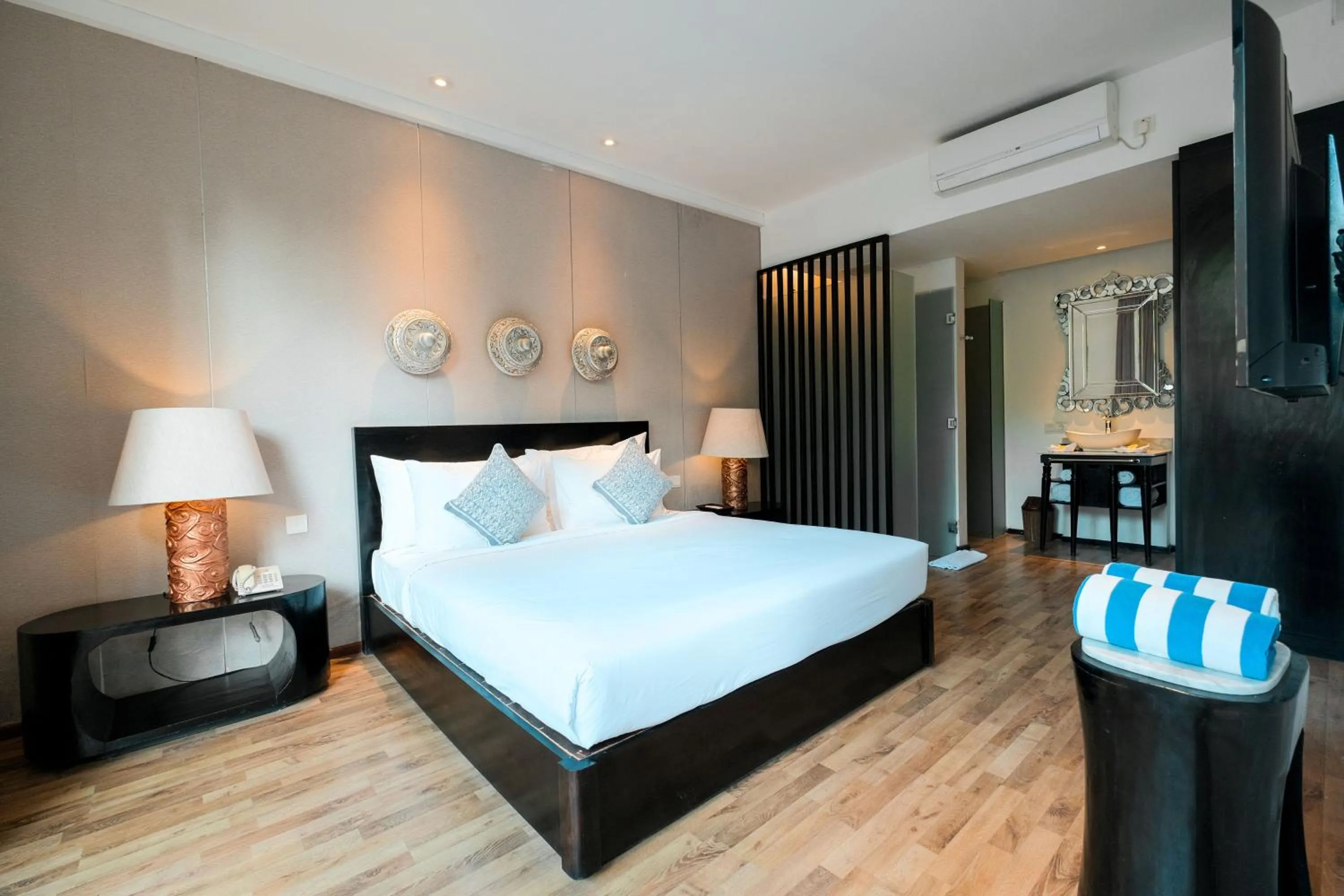 Bed in The Lavana Akatara Villa Nusa Dua