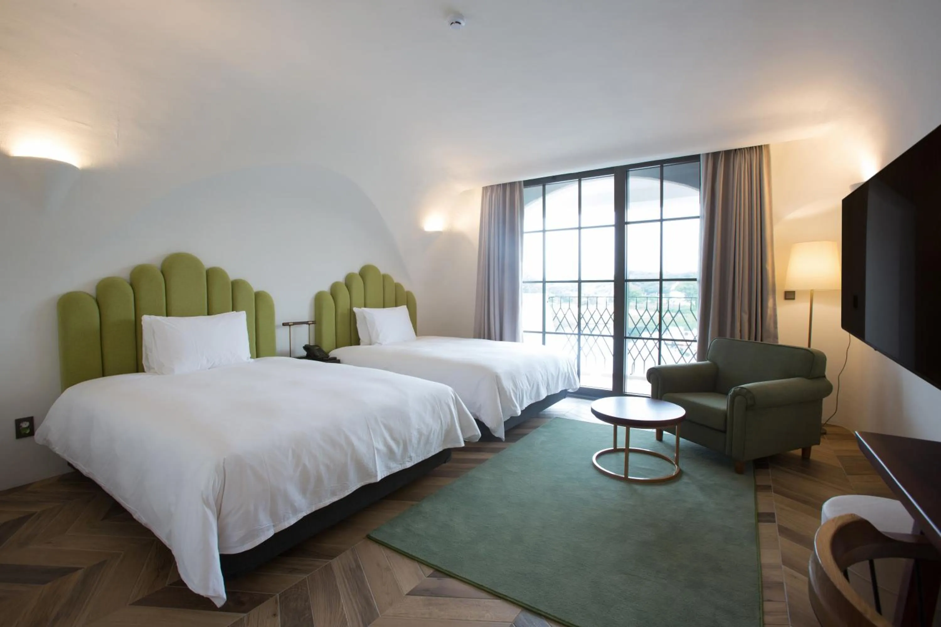 Bed in Ecoland Hotel