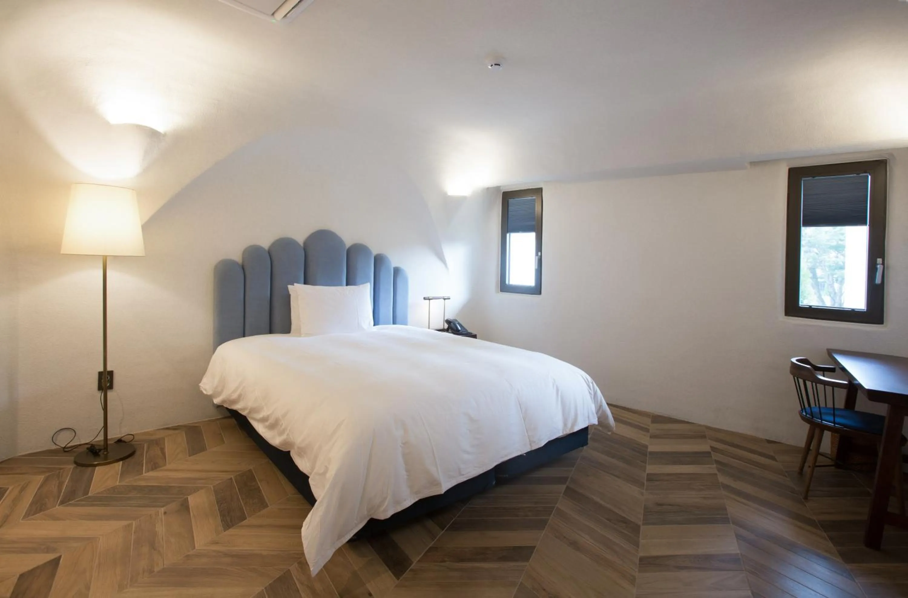 Bed in Ecoland Hotel