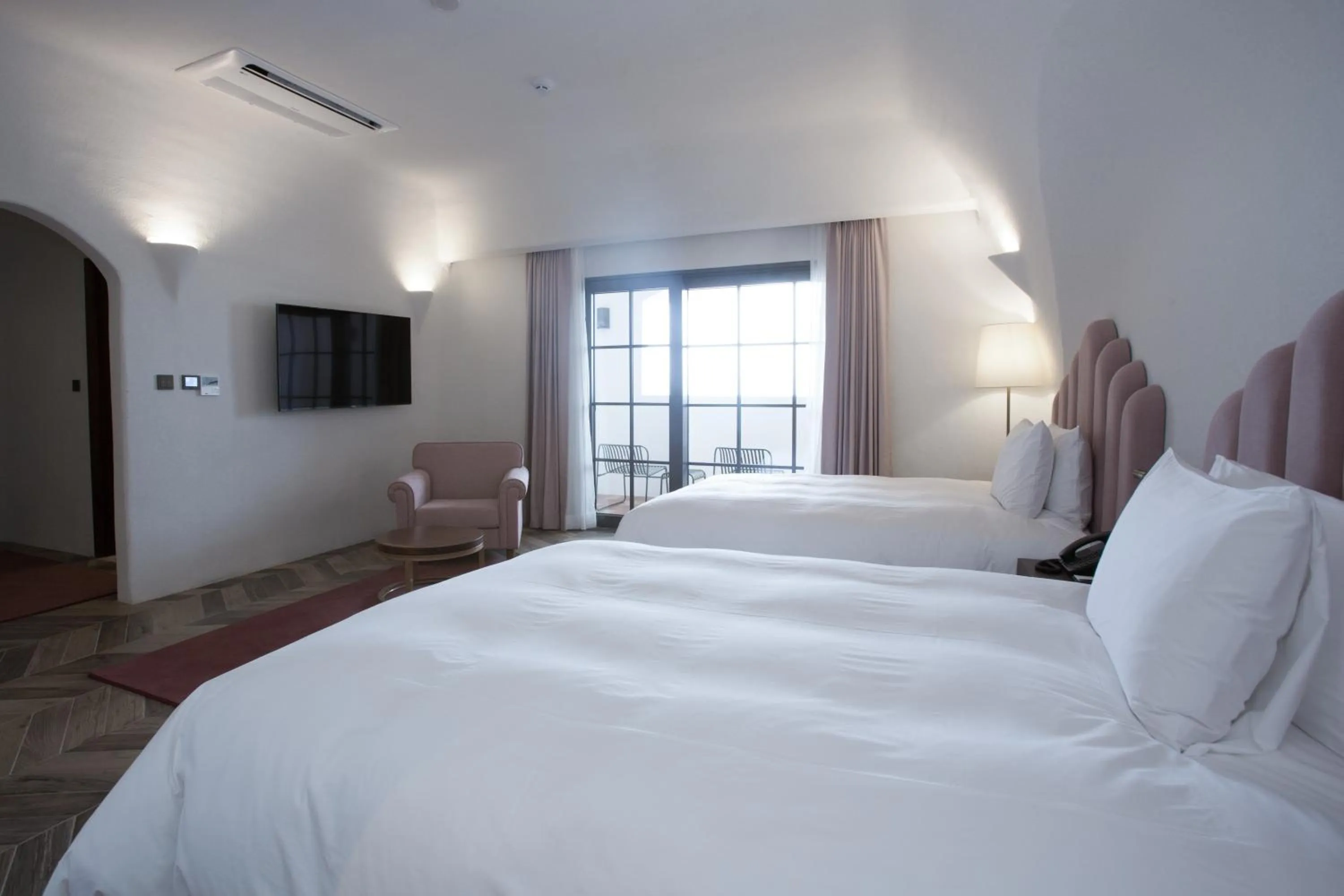 Bed in Ecoland Hotel