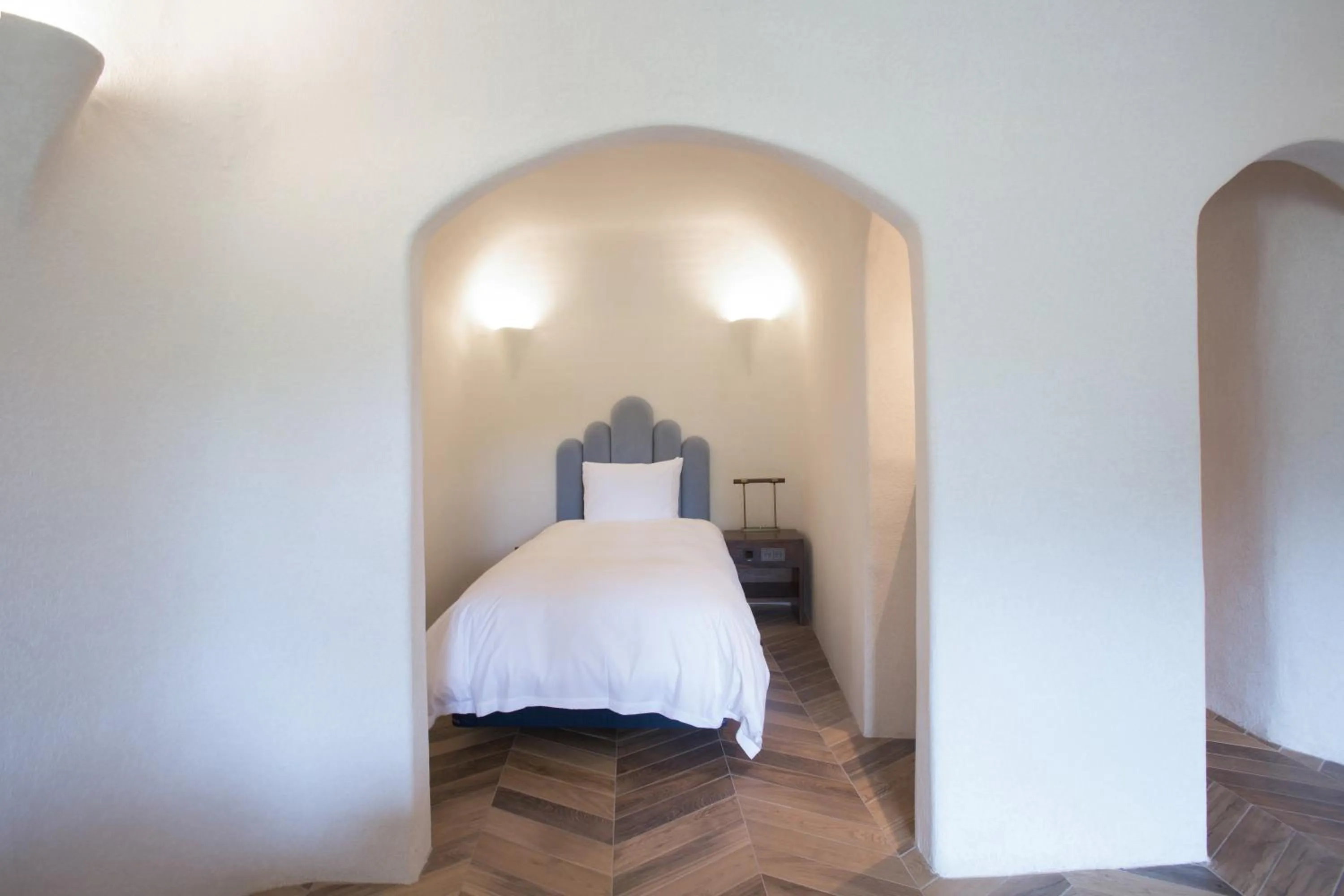 Bed in Ecoland Hotel