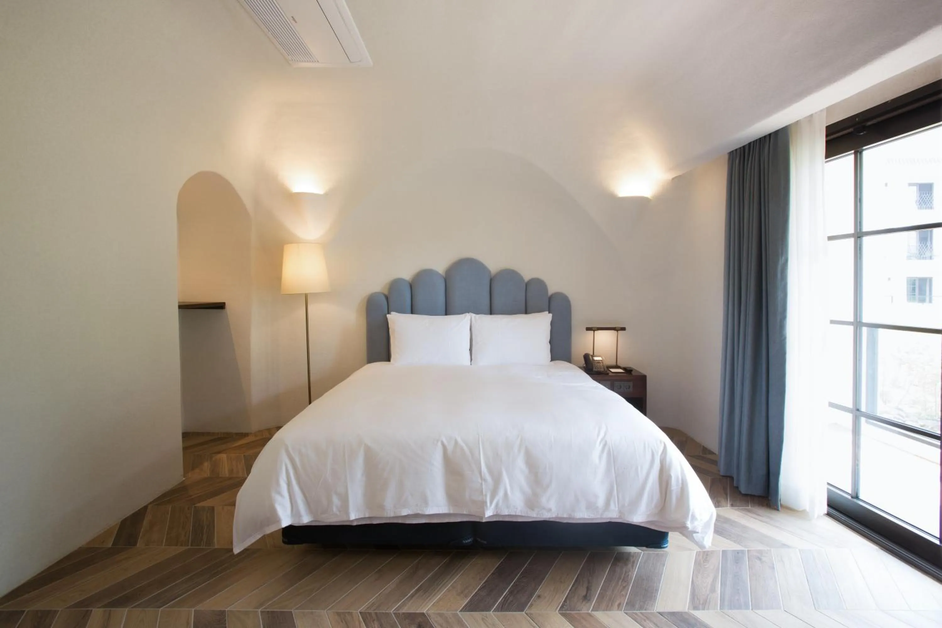 Bed in Ecoland Hotel