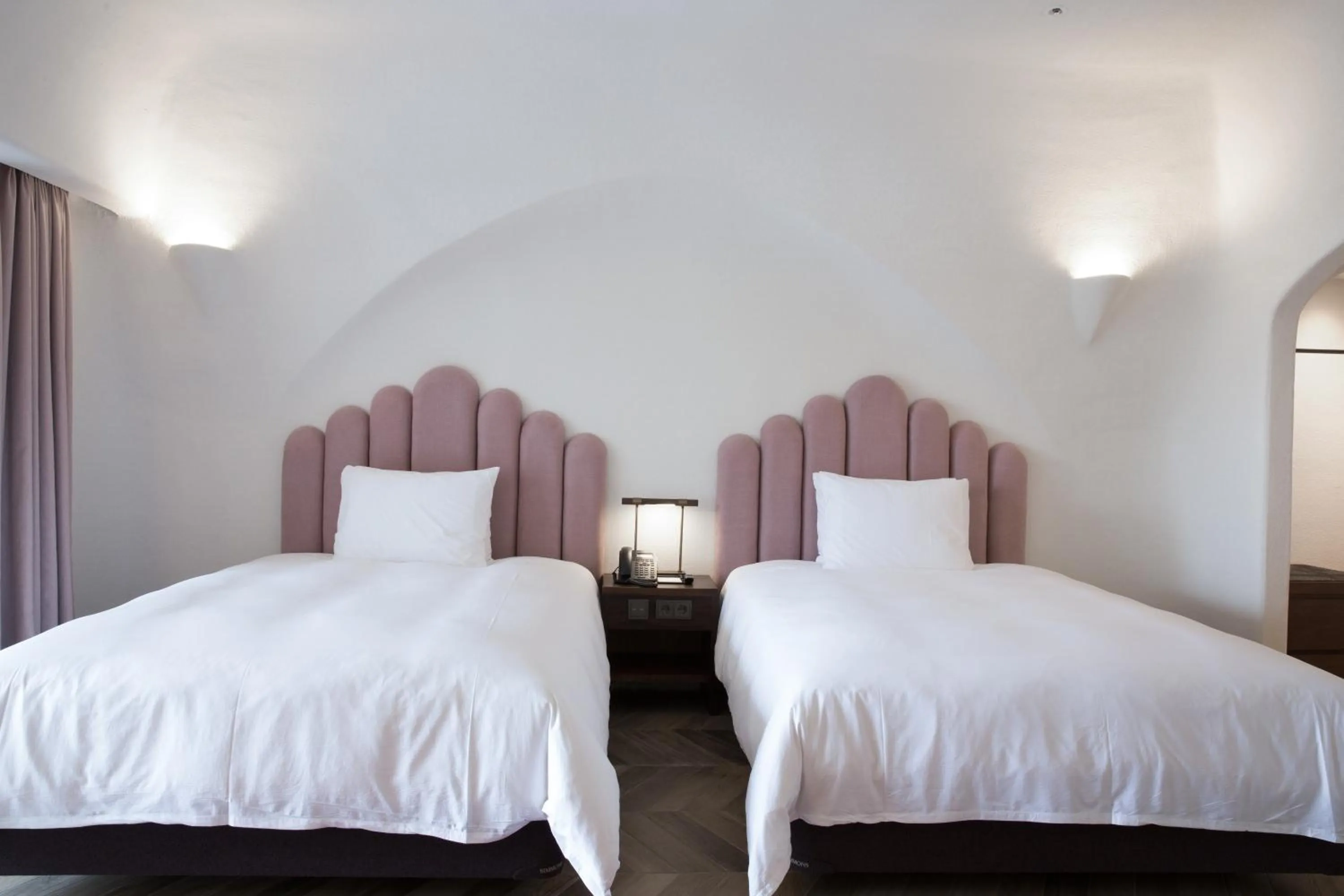 Bed in Ecoland Hotel