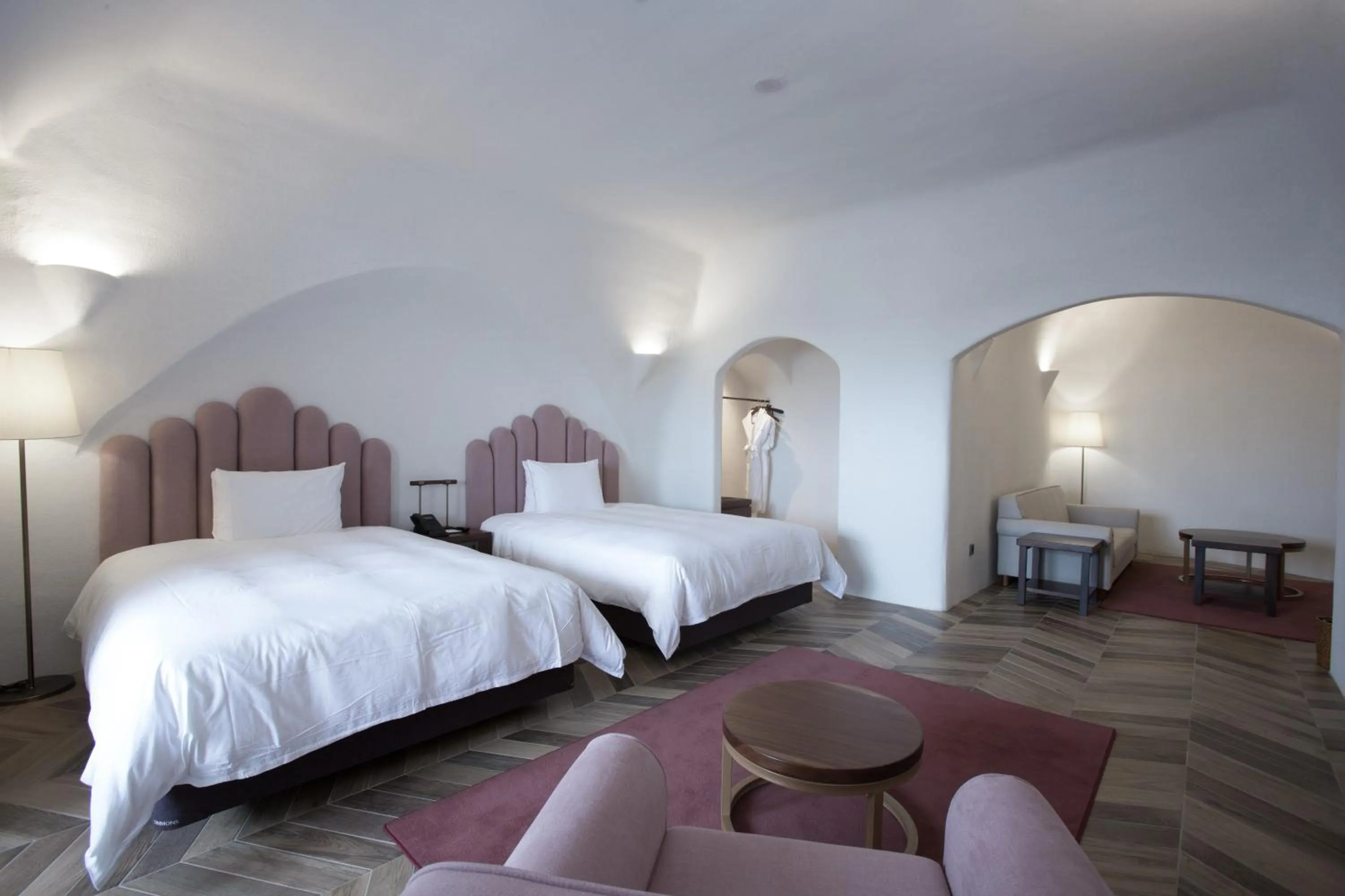 Bed in Ecoland Hotel