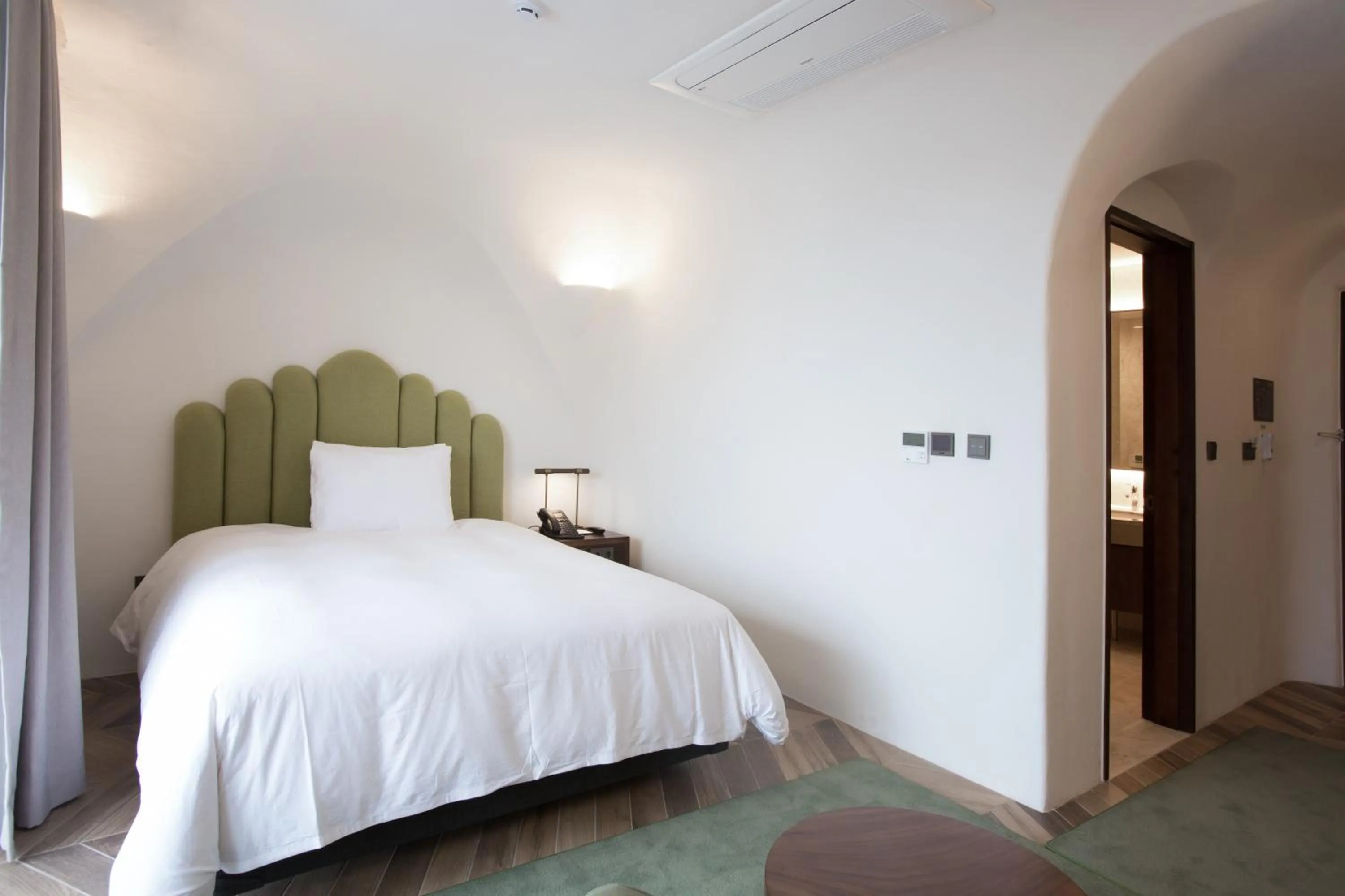 Bed in Ecoland Hotel