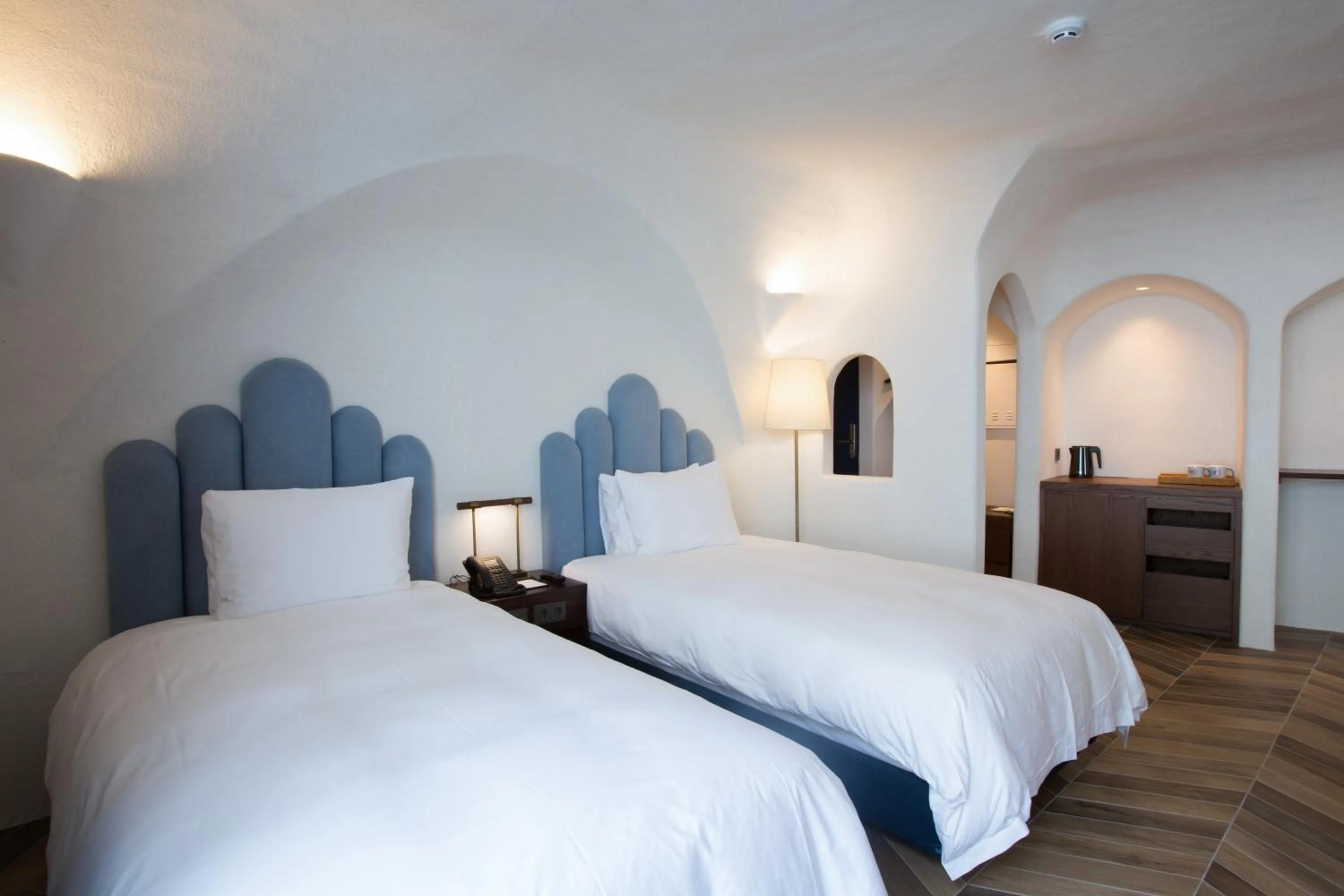 Bed in Ecoland Hotel