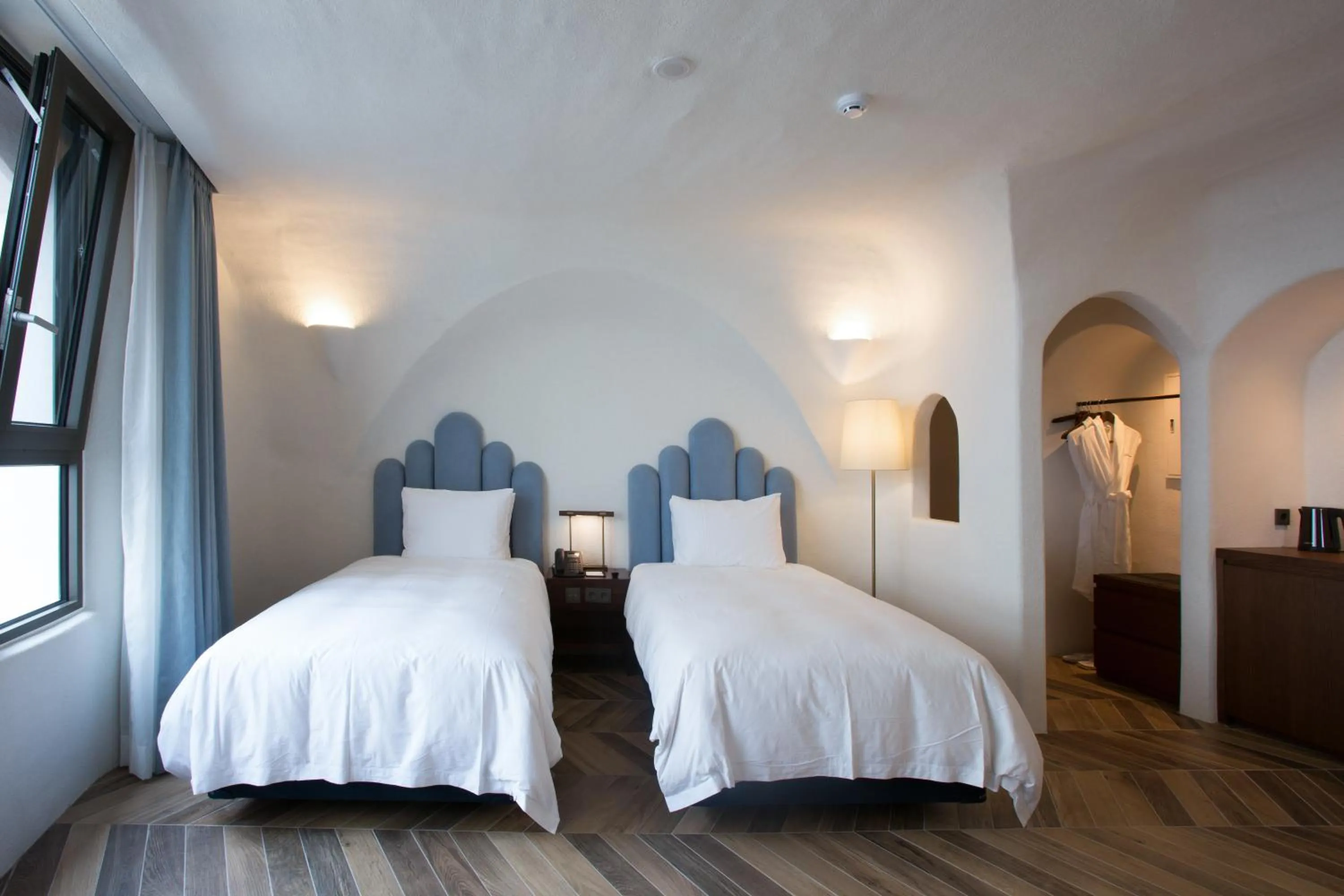 Bed in Ecoland Hotel