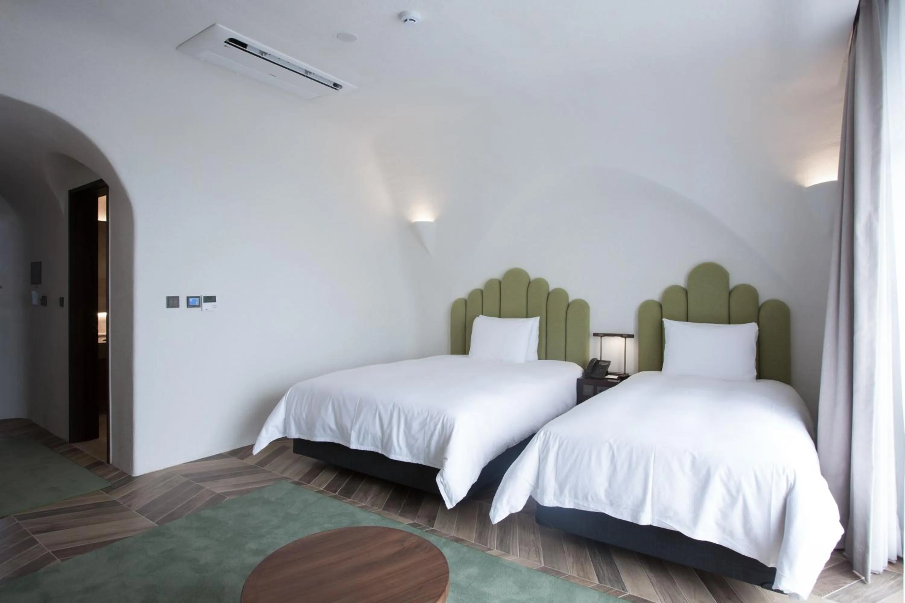 Bed in Ecoland Hotel