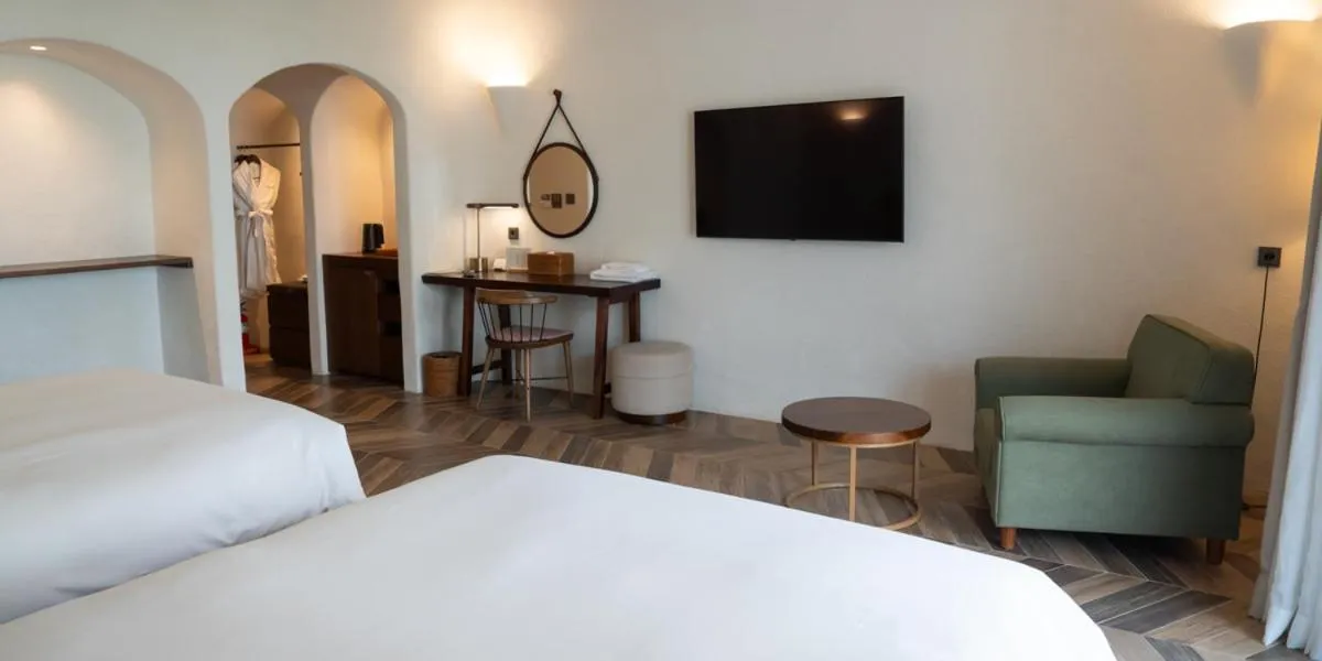 Bed in Ecoland Hotel