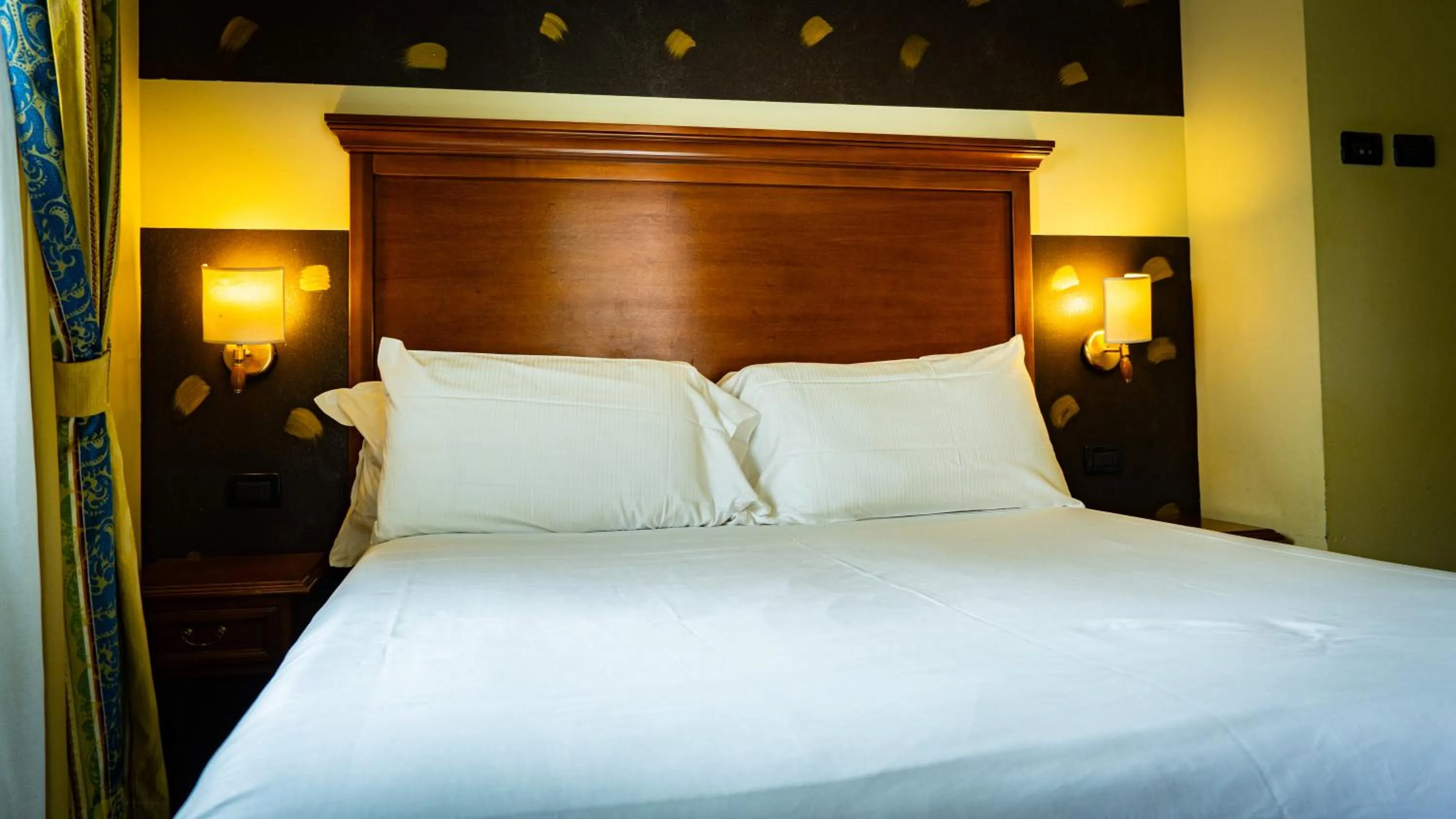 Bed in Hotel Au Soleil