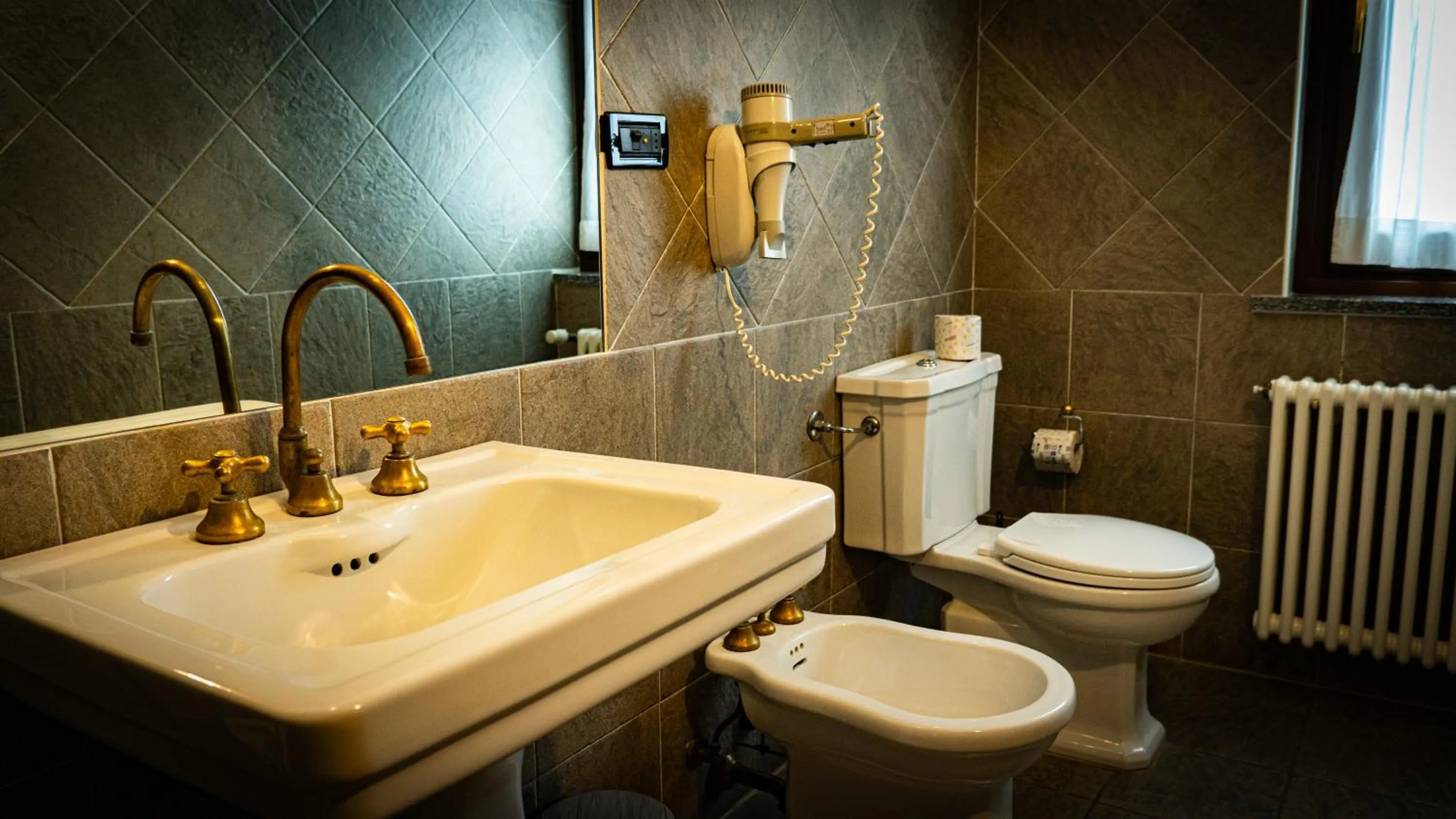Bathroom in Hotel Au Soleil