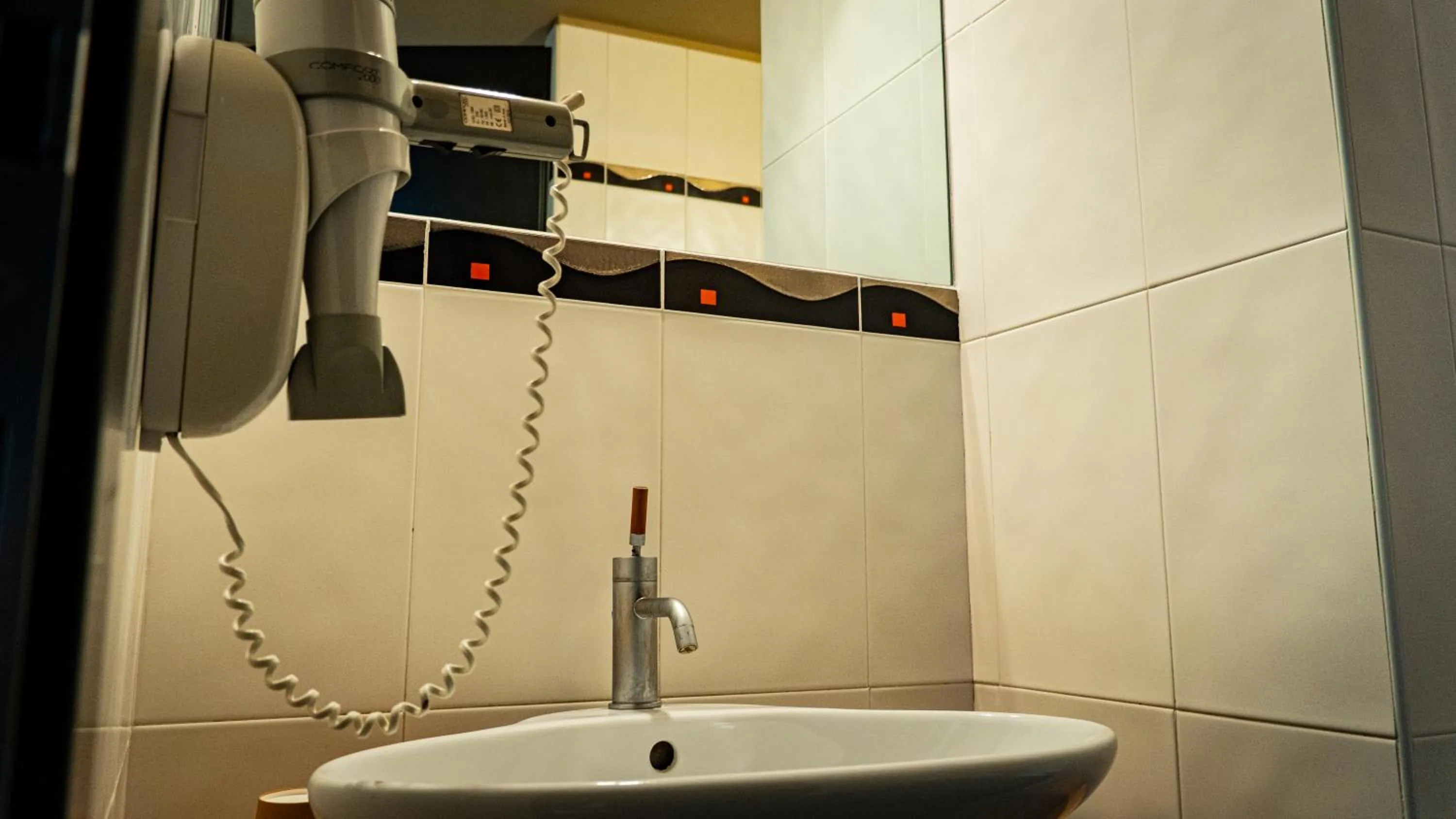 Shower in Hotel Au Soleil