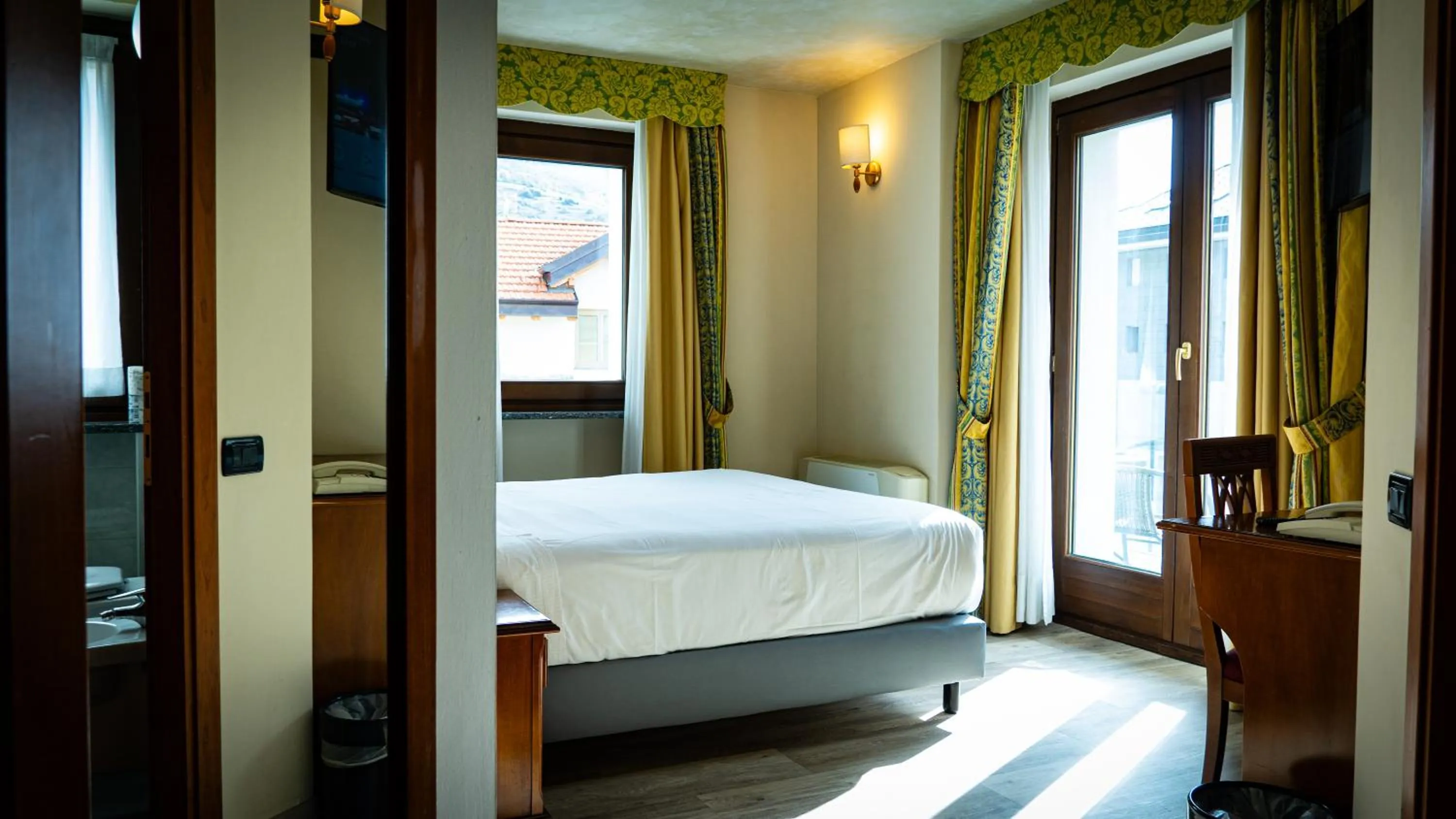 Bed in Hotel Au Soleil