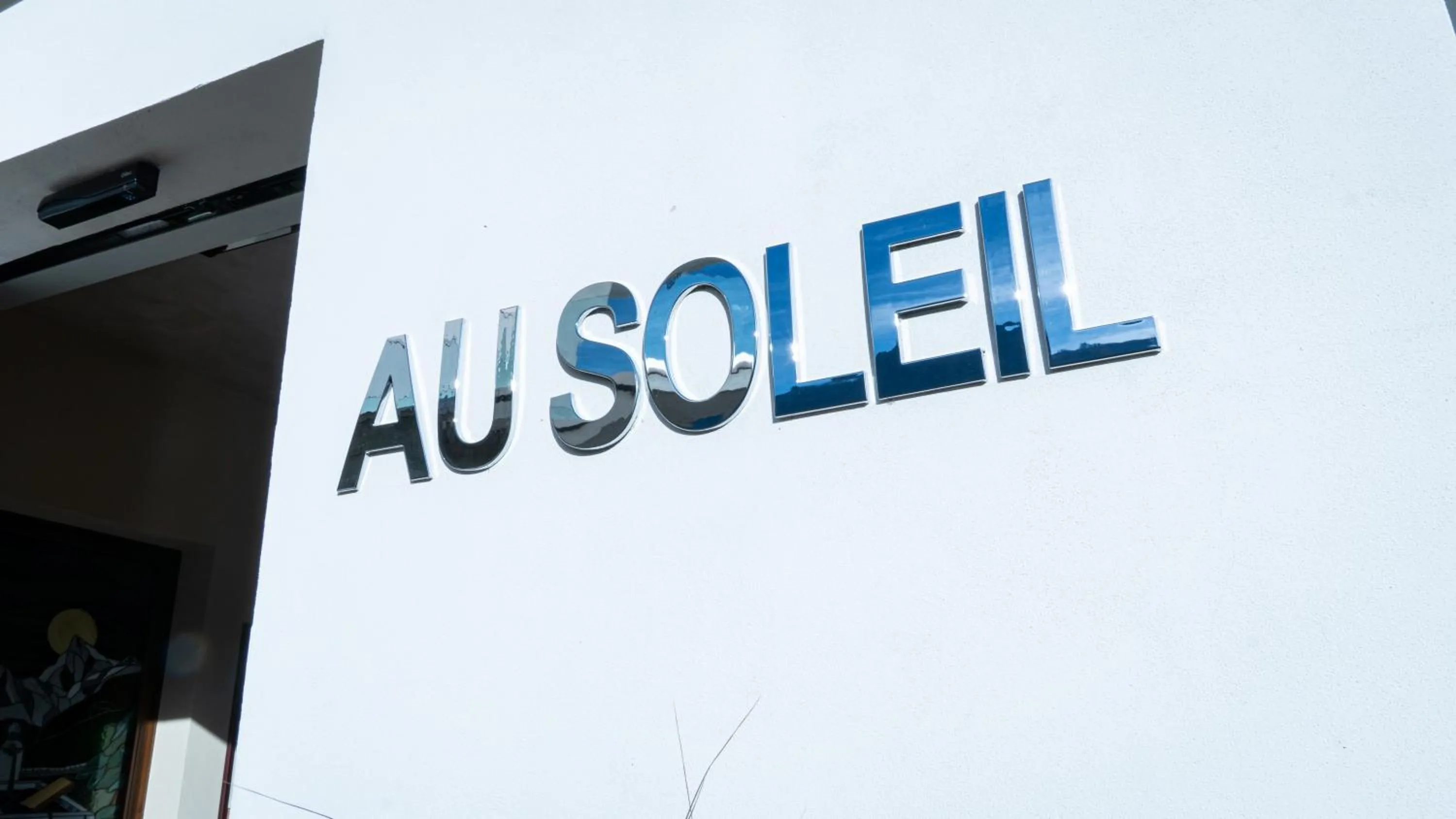 Property logo or sign in Hotel Au Soleil