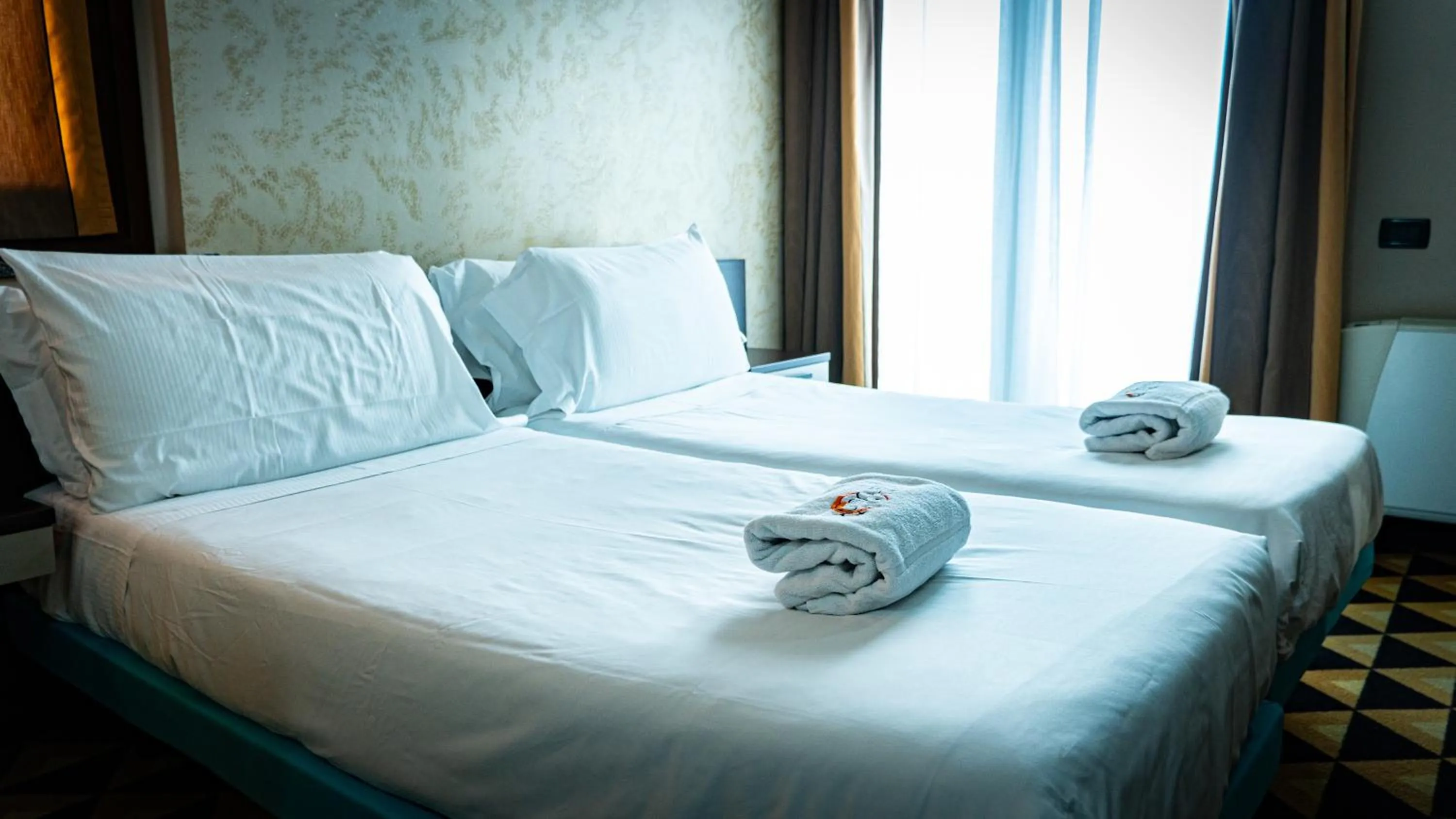 Bed in Hotel Au Soleil