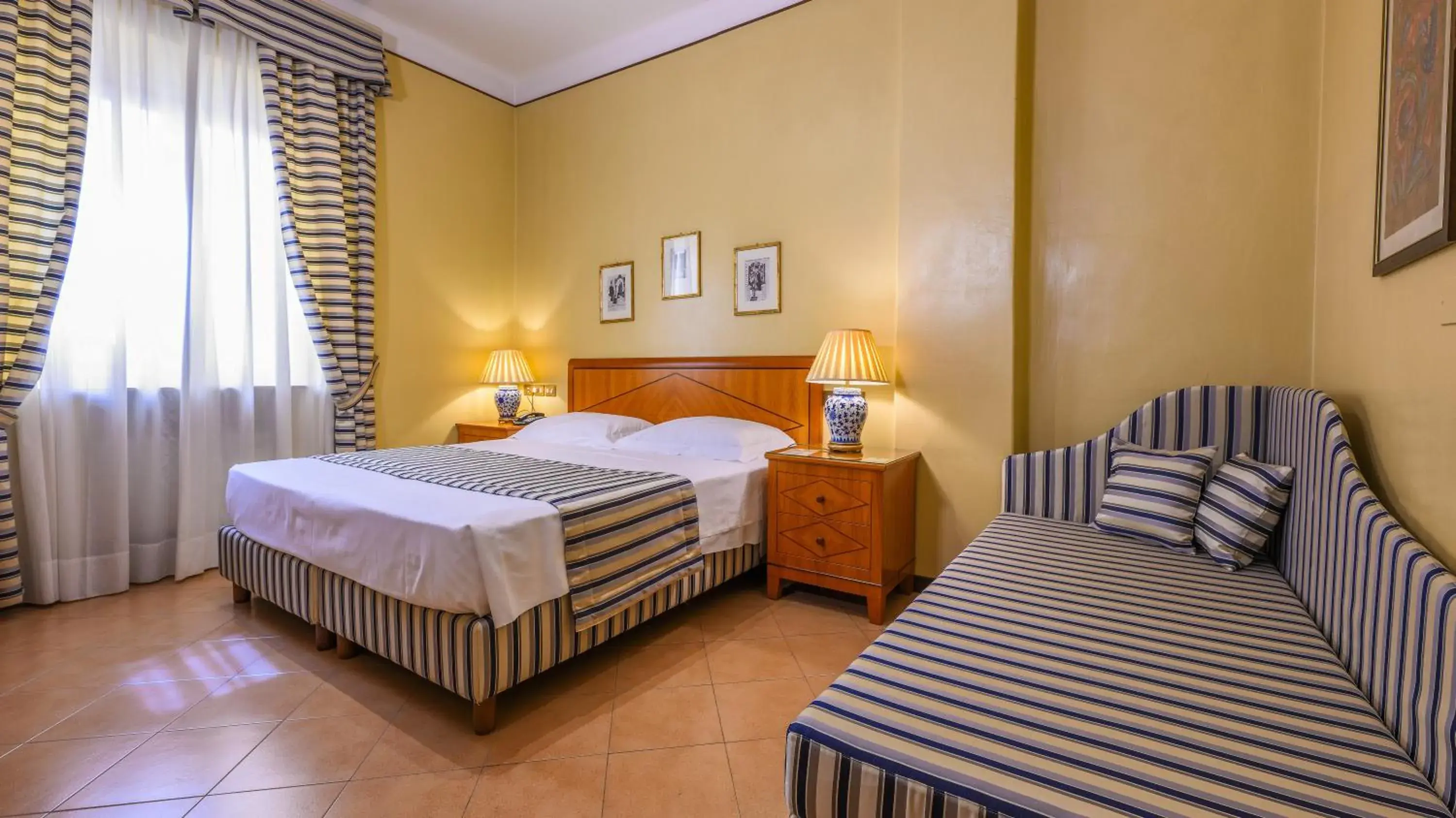 Photo of the whole room, Bed in Albergo Reggio Photo of the whole room, Bed in Albergo Reggio
