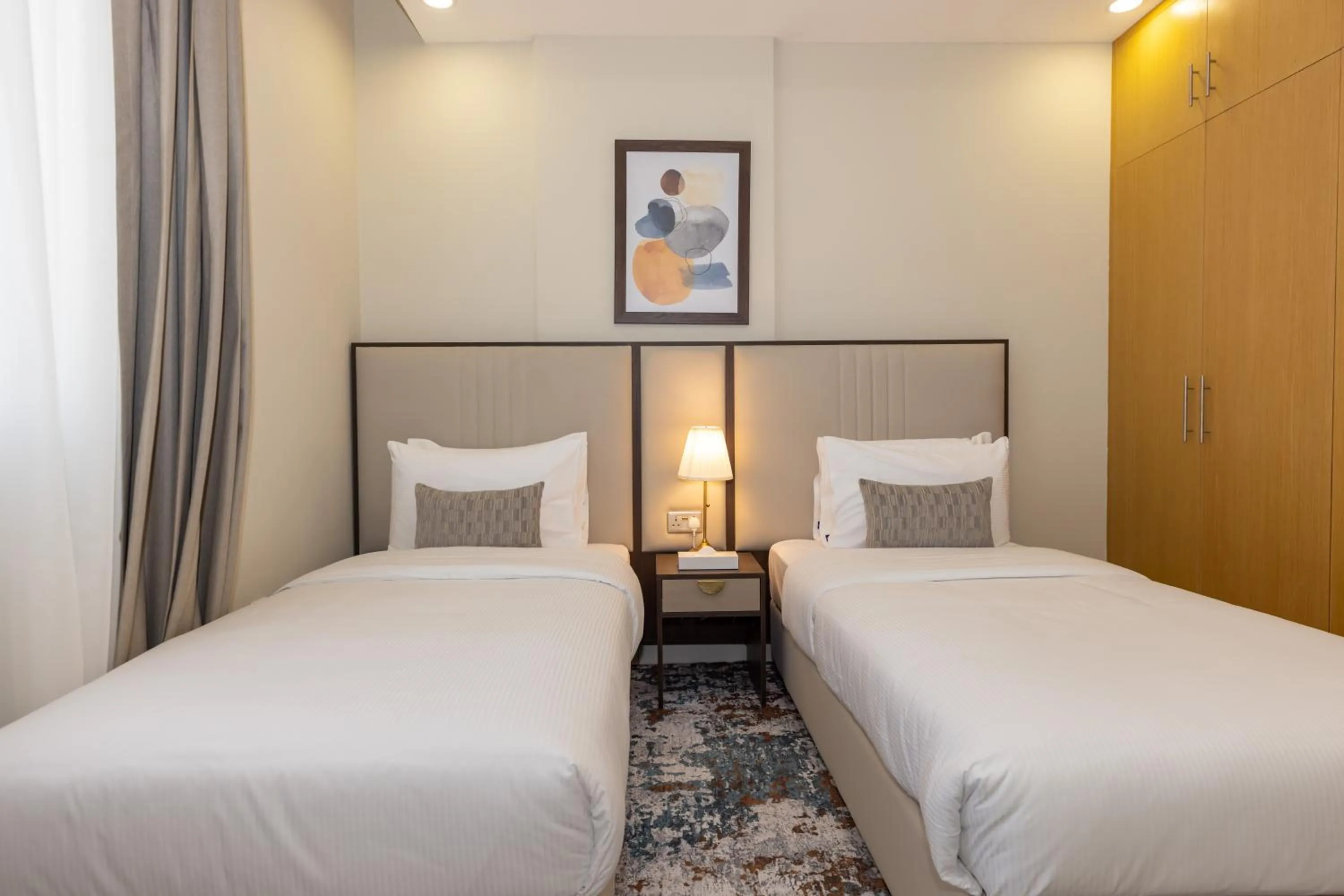 Bed in Platinum Coast Hotel Apartments