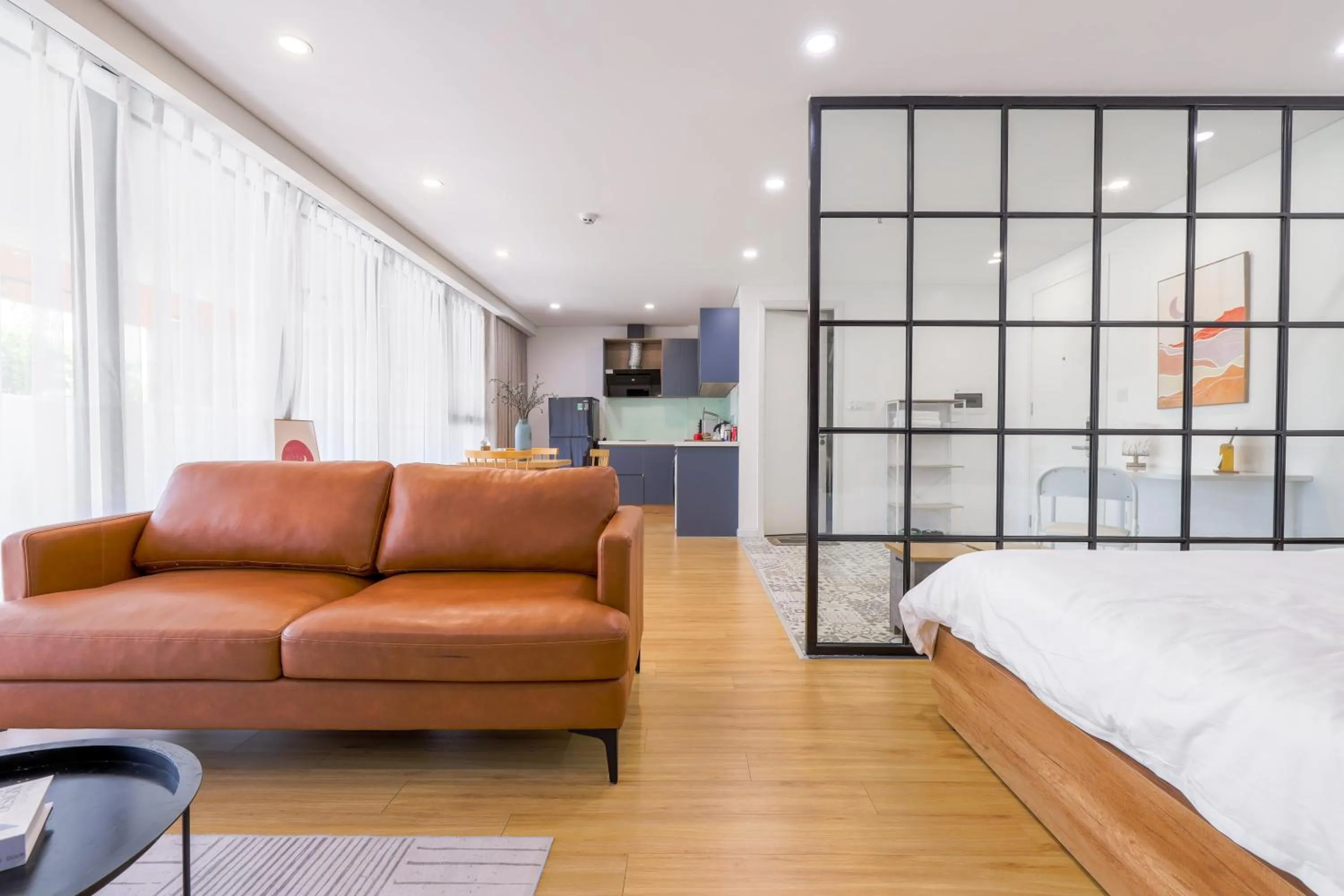 Bed in LAGOM APARTMENT AND HOTEL