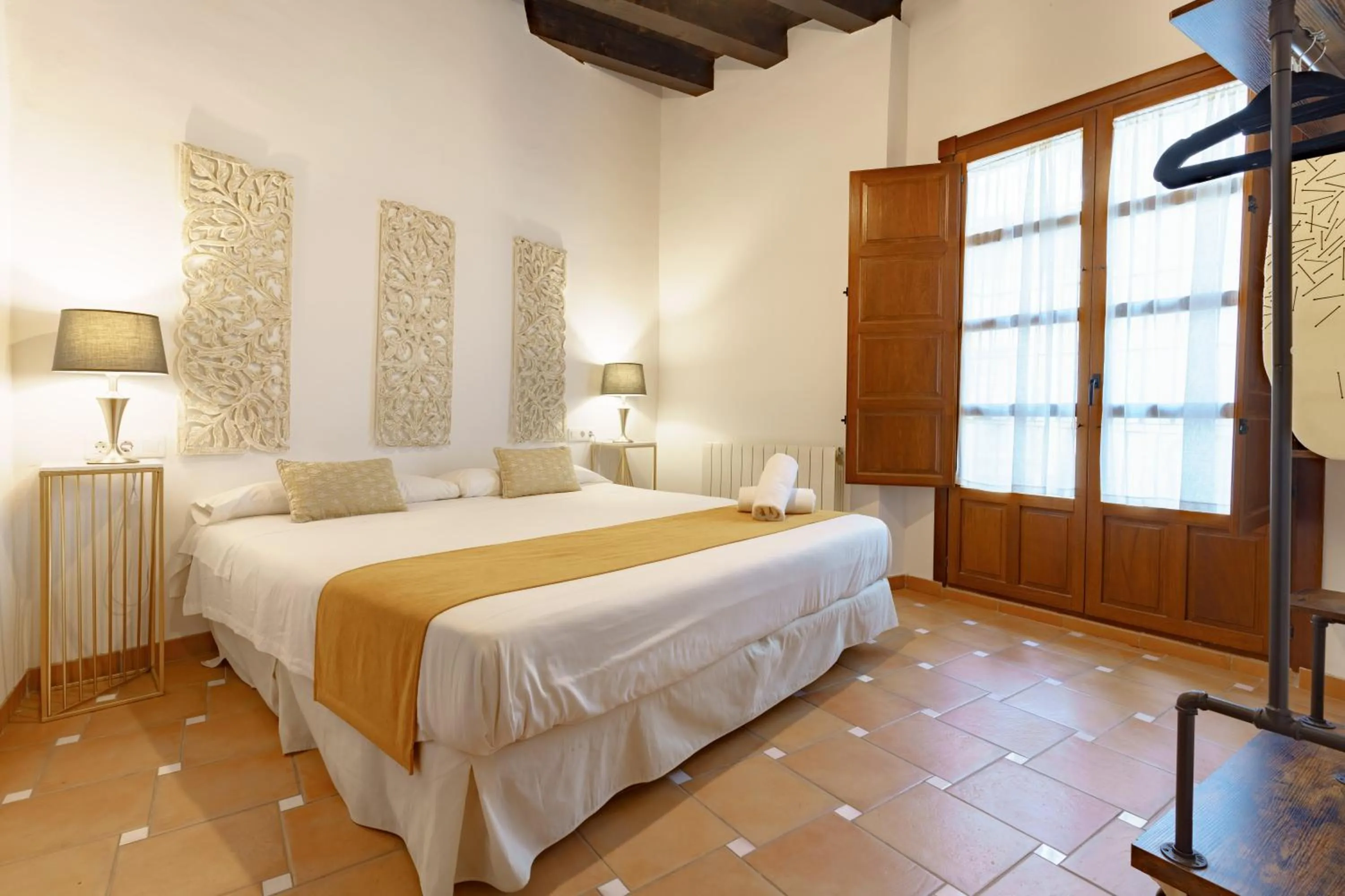 Bed in SUITES CASA DE LAS COLUMNAS