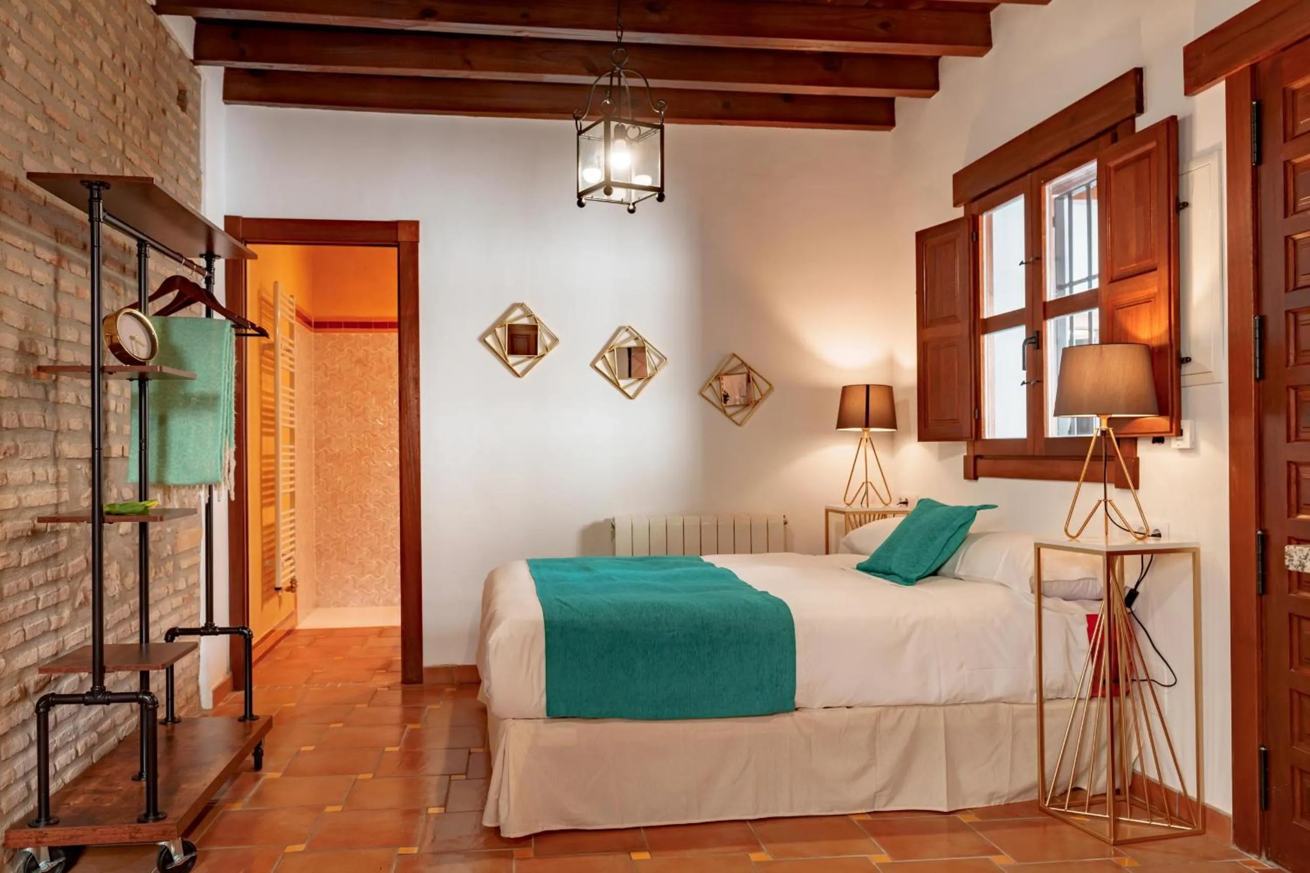 Bed in SUITES CASA DE LAS COLUMNAS