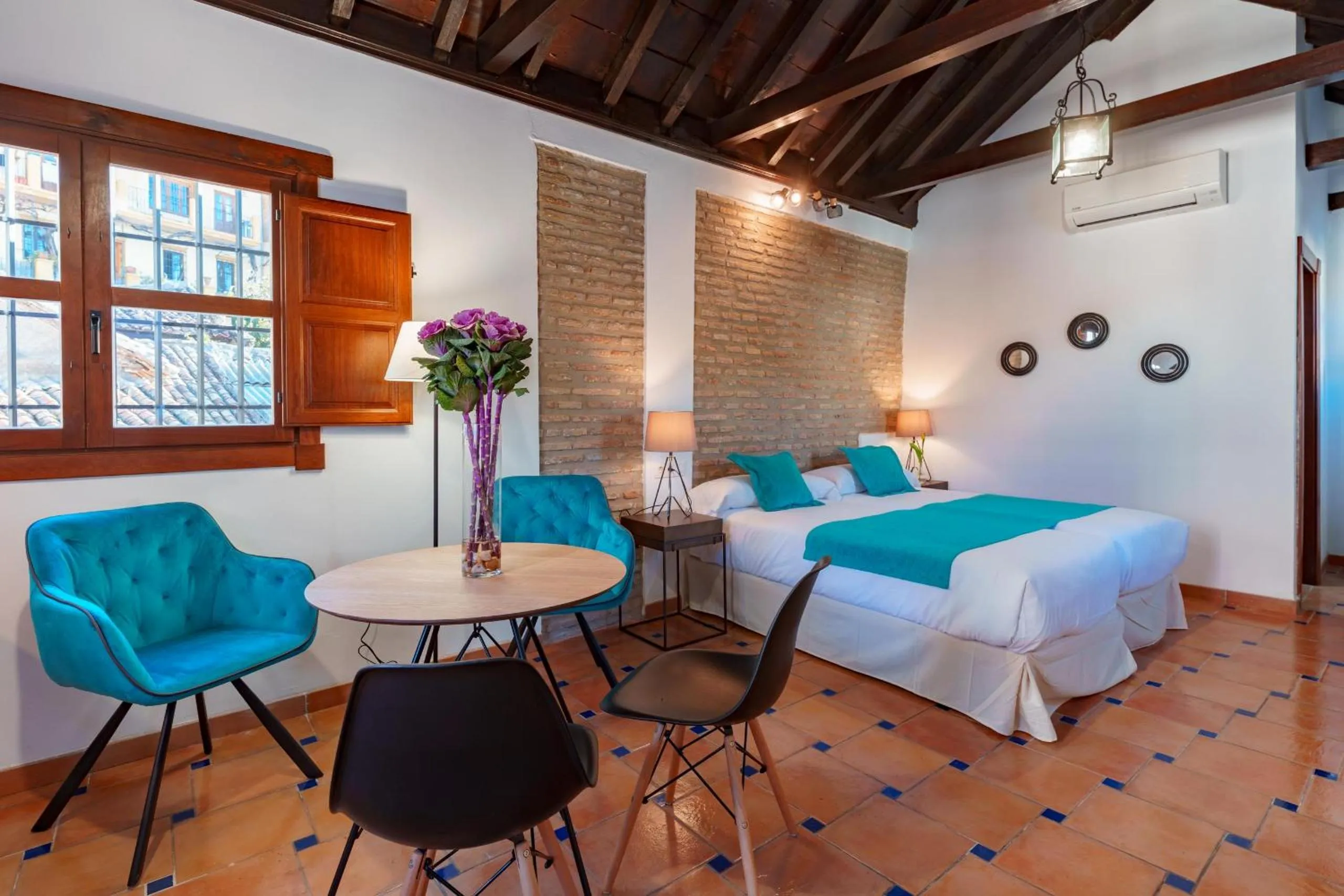 Bed in SUITES CASA DE LAS COLUMNAS