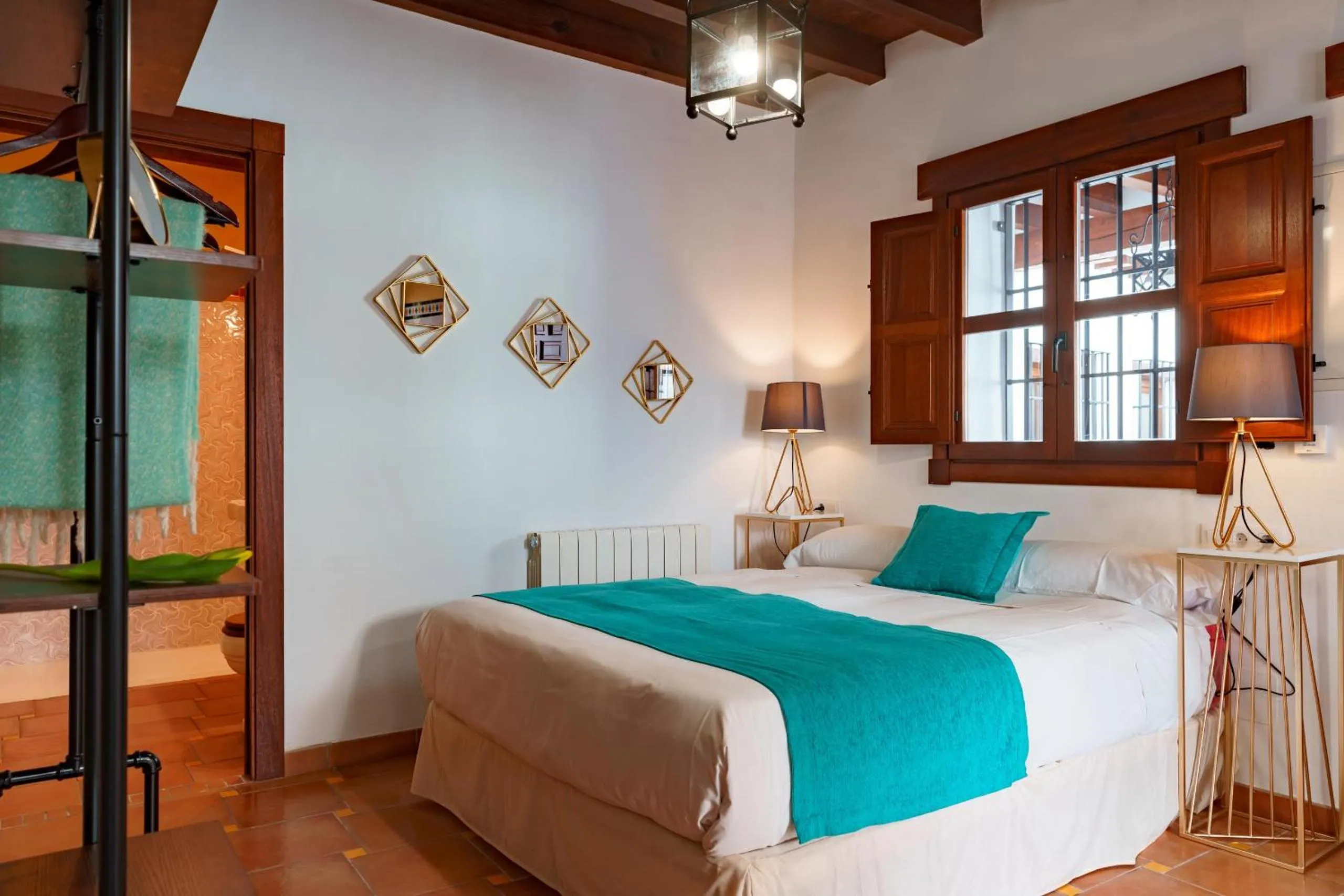 Bed in SUITES CASA DE LAS COLUMNAS