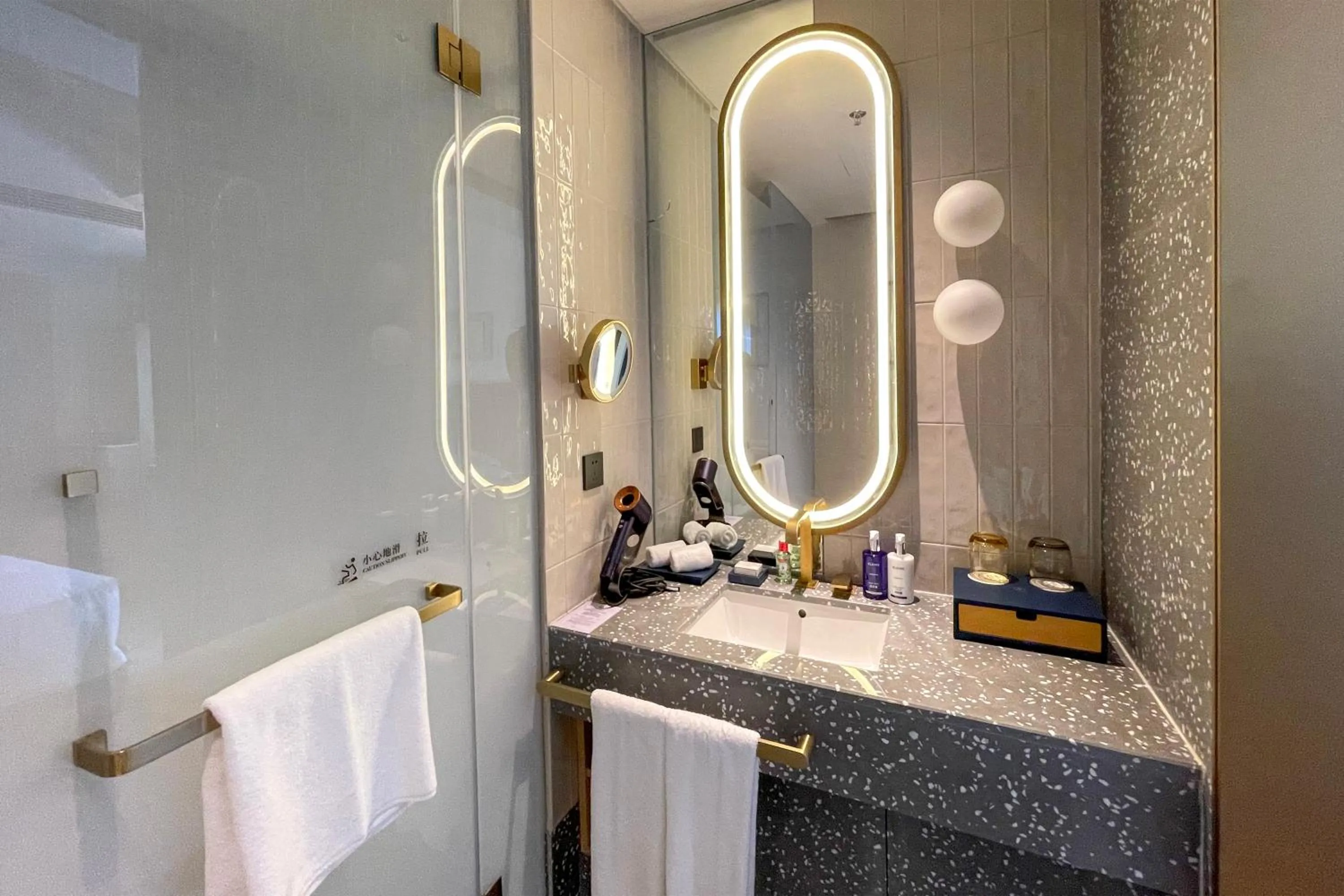 Bathroom in voco Nanjing Garden Expo by IHG