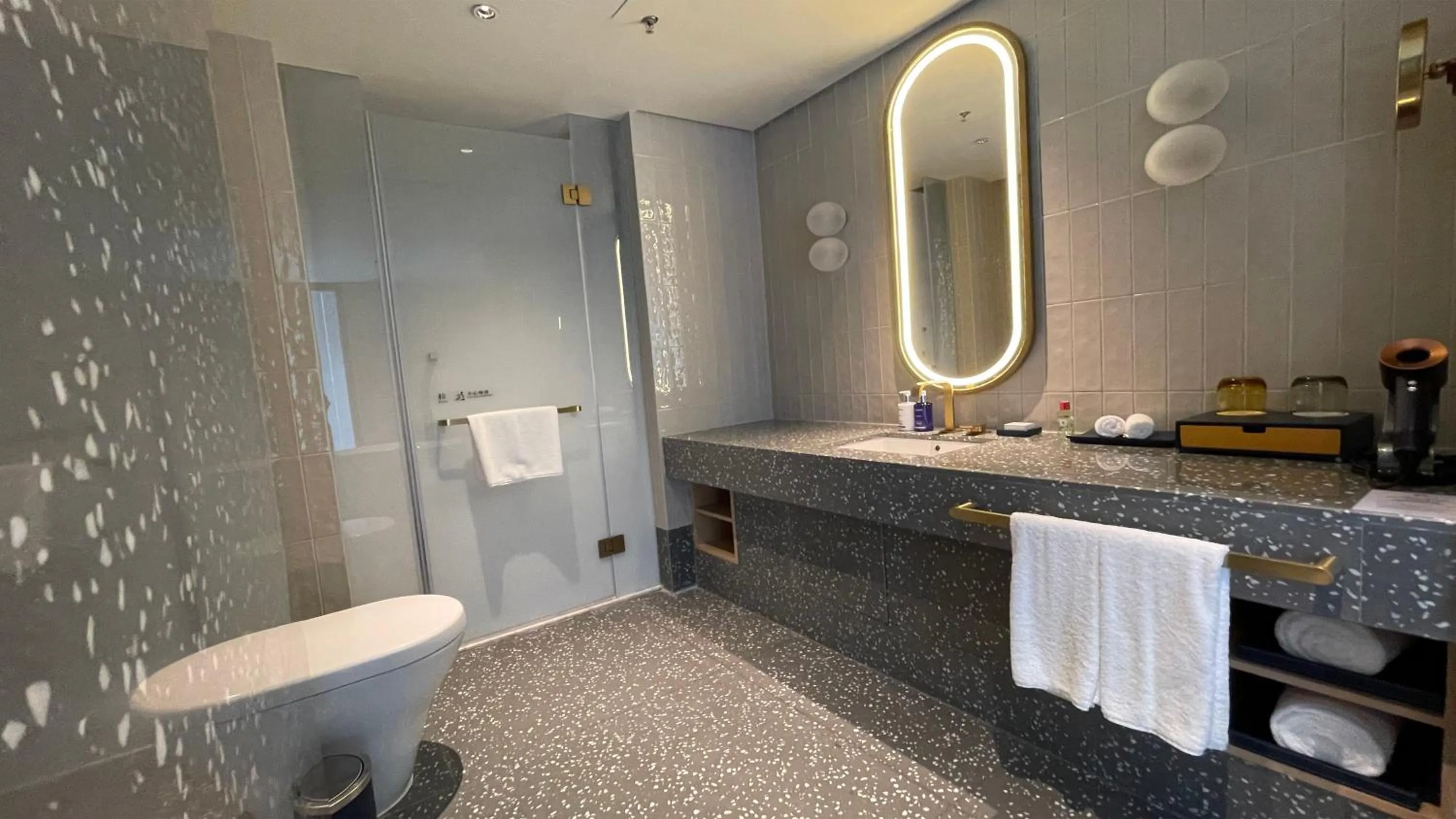 Bathroom in voco Nanjing Garden Expo by IHG